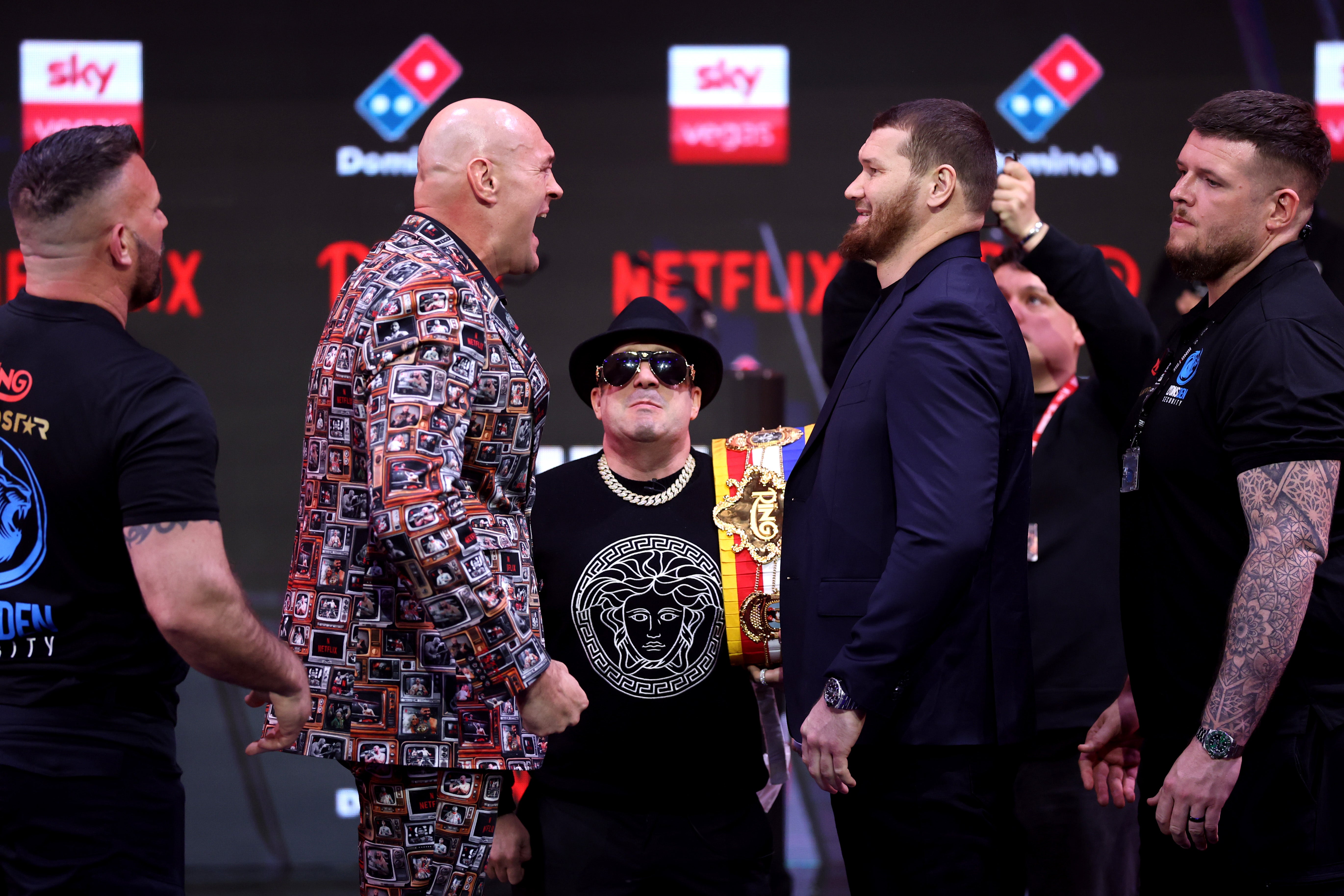 Tyson Fury (left) and Arslanbek Makhmudov face off at their final press conference