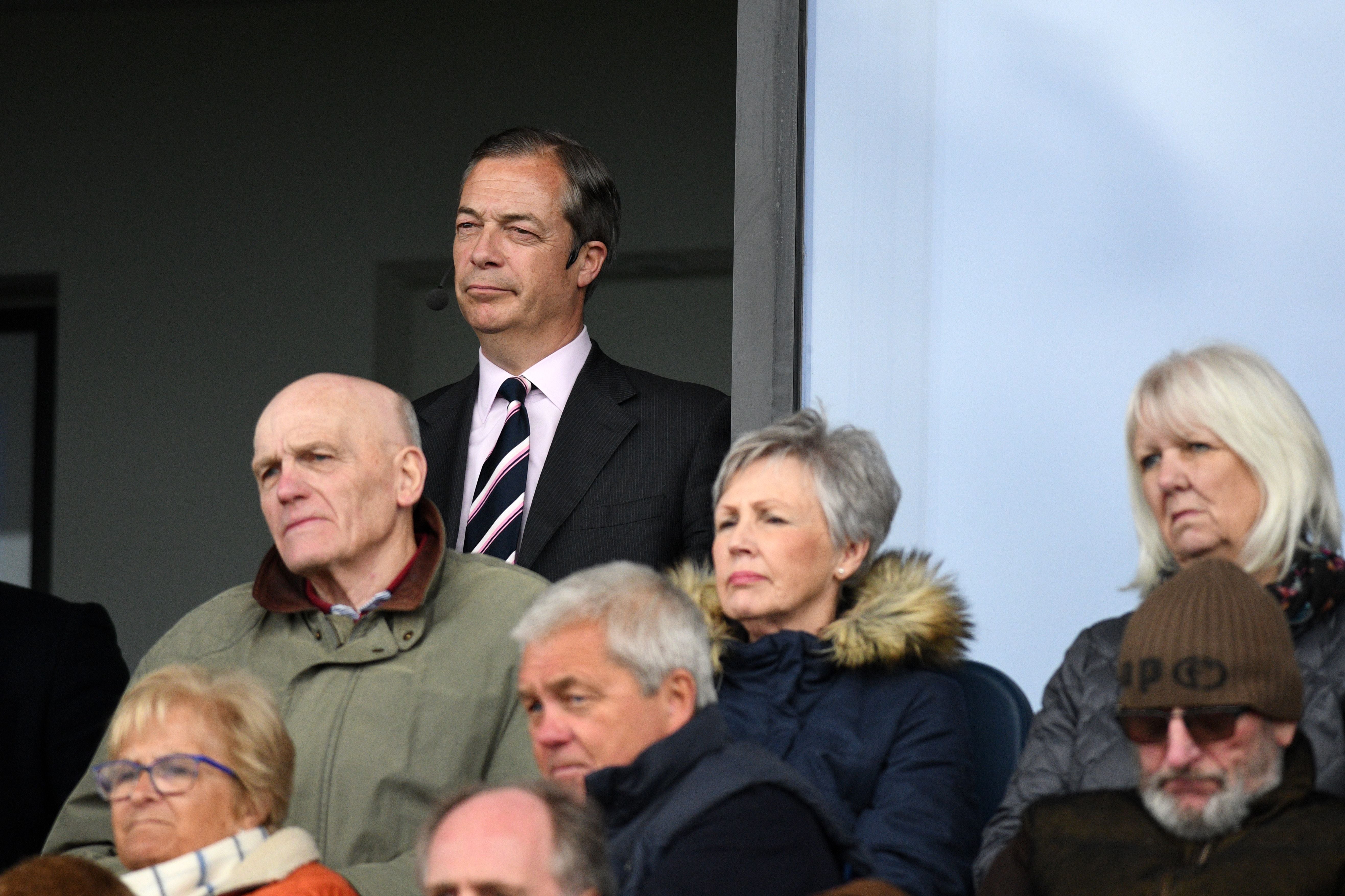 Mr Farage pictured listening to speeches at a Brexit Party event in 2019. In front of him is the couple who appear to be this week’s Reform competition winners
