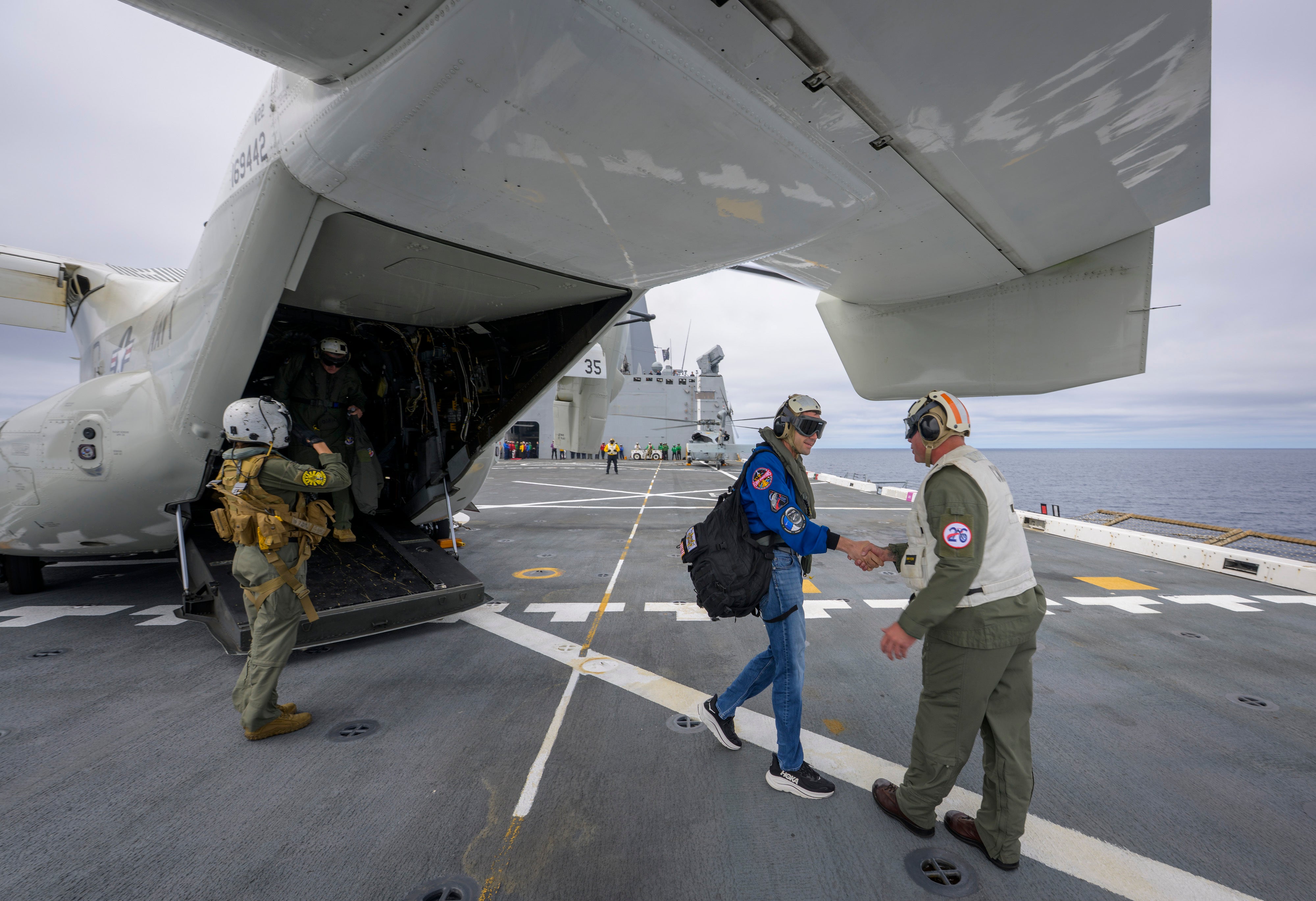Nasa Administrator Jared Isaacman arrives aboard the USS John P. Murtha in the Pacific Ocean on 10 April, 2026