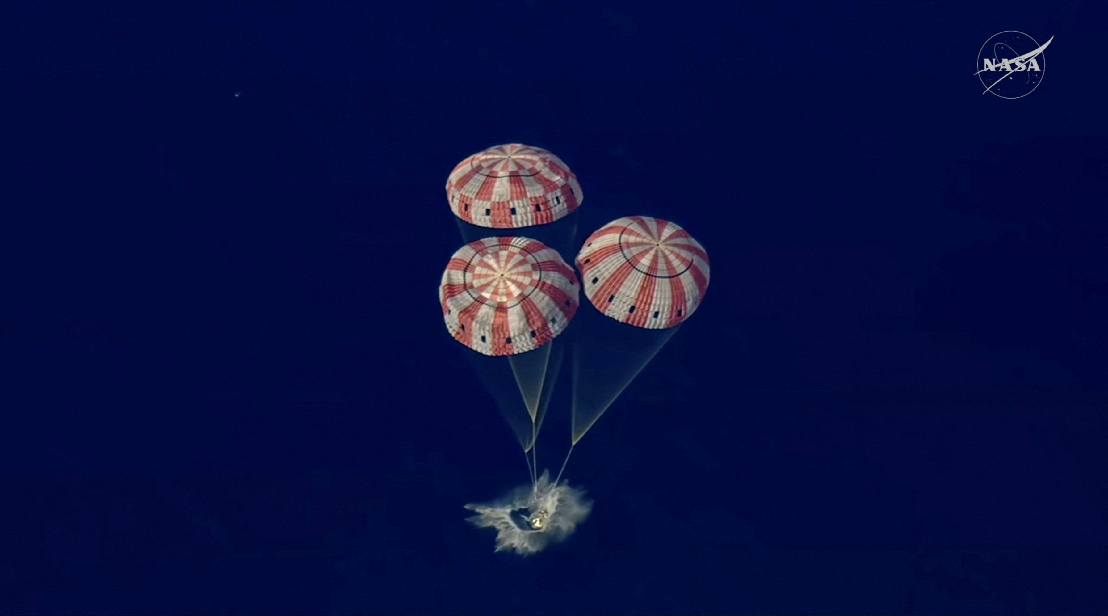 The astronauts arrived safely back on Earth Friday after a dangerous reentry