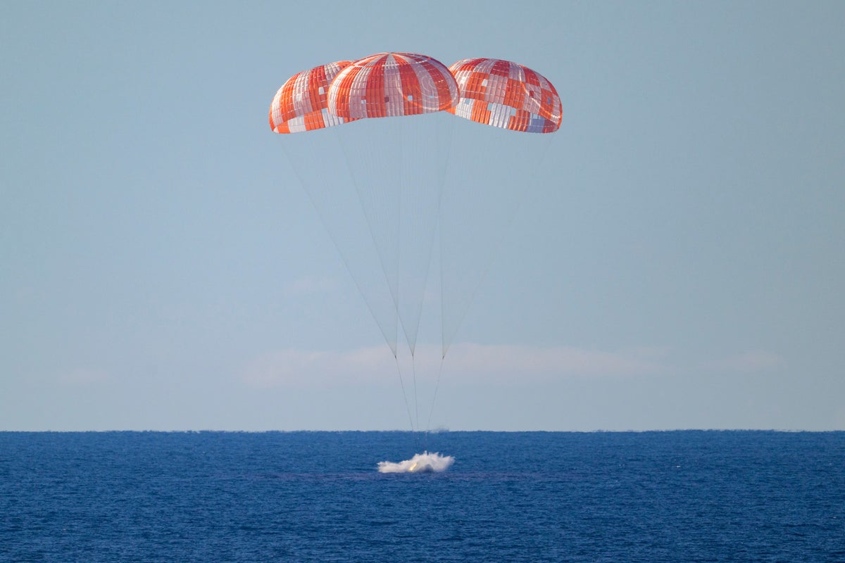 First manned Moon mission in more than 50 years splashes down after epic voyage