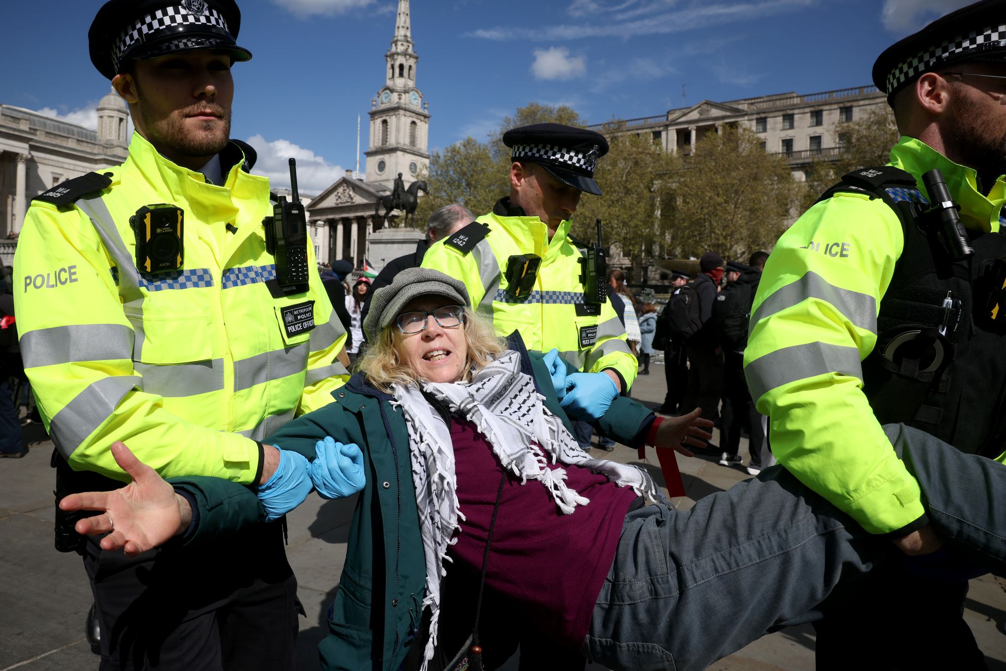 Police make arrests as demonstrators participate in 'Everyone Day', a mass action against the Government's proscription of Palestine Action, at Trafalgar Square