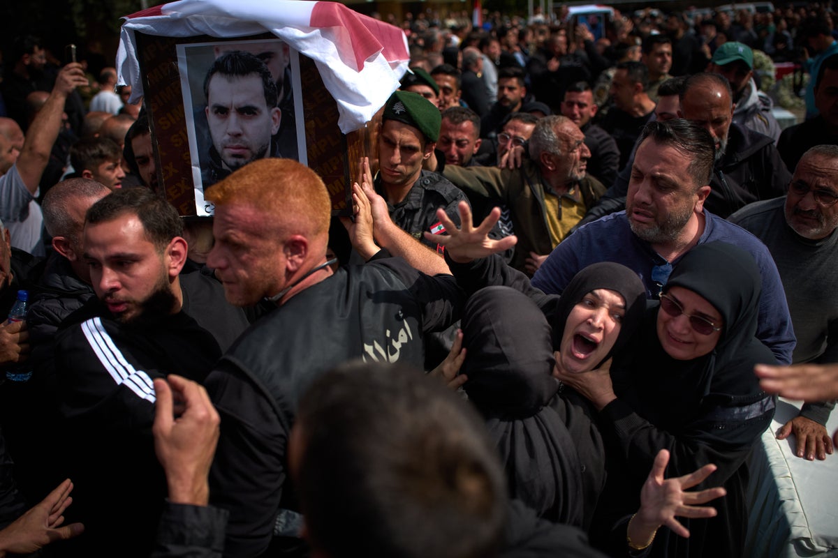 Lebanese bury 13 officers killed by Israel as grief and rage surge ahead of talks in the US