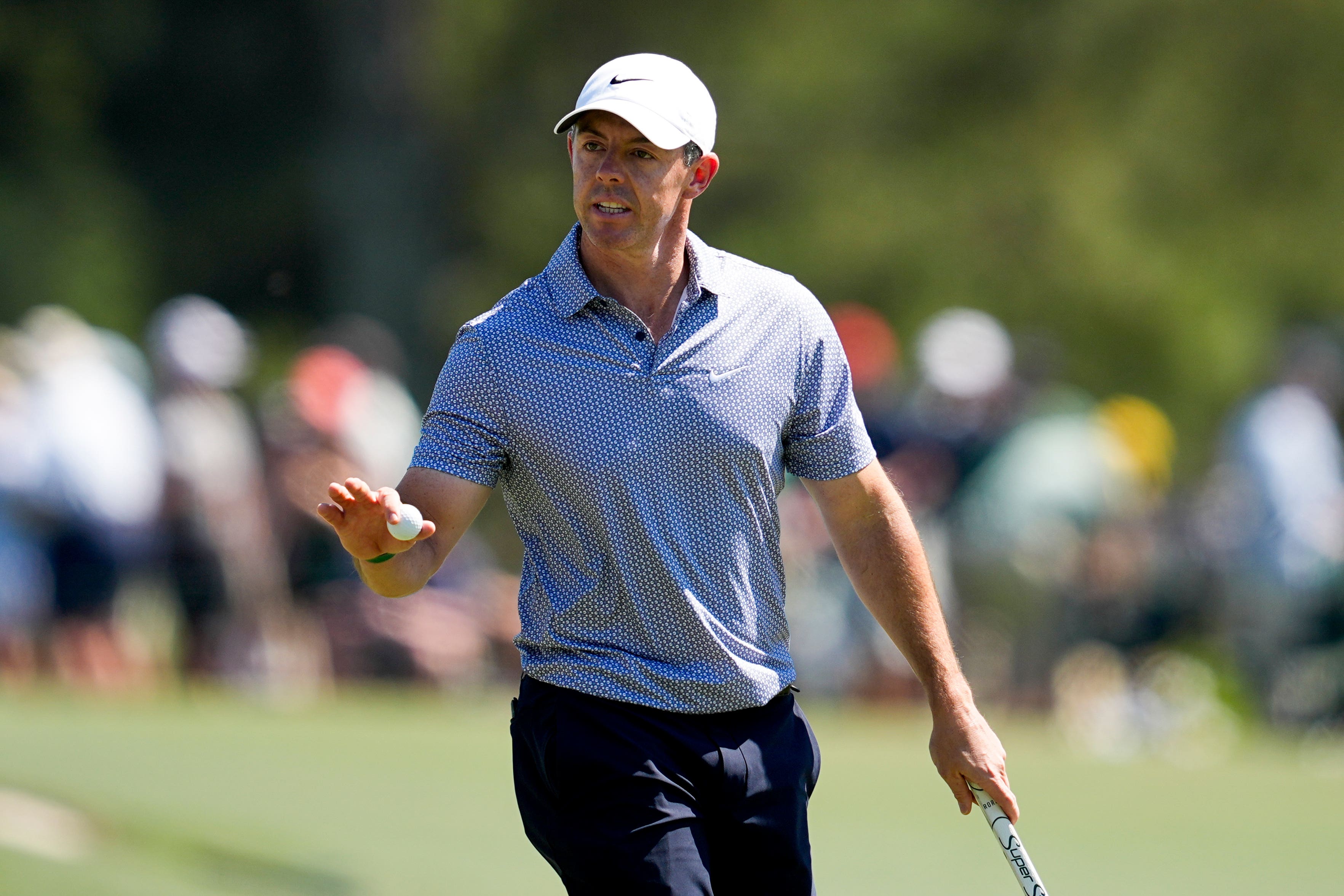 Rory McIlroy waves to the Augusta crowd (Gerald Herbert/AP)