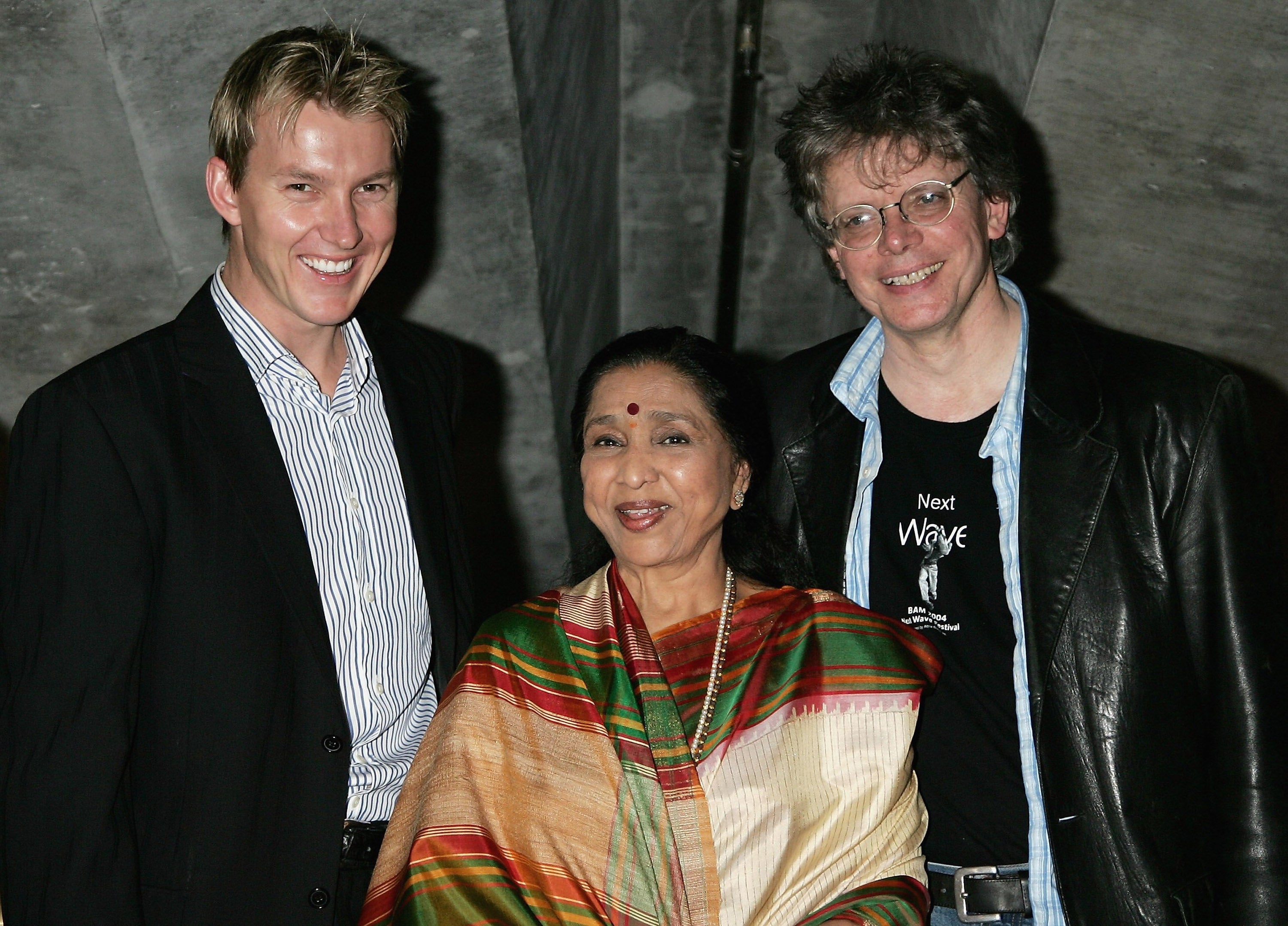 Asha Bhosle (C), Australian cricketer Brett Lee (L) and violinist David Harrington (R) promote their performance at the Sydney Opera House