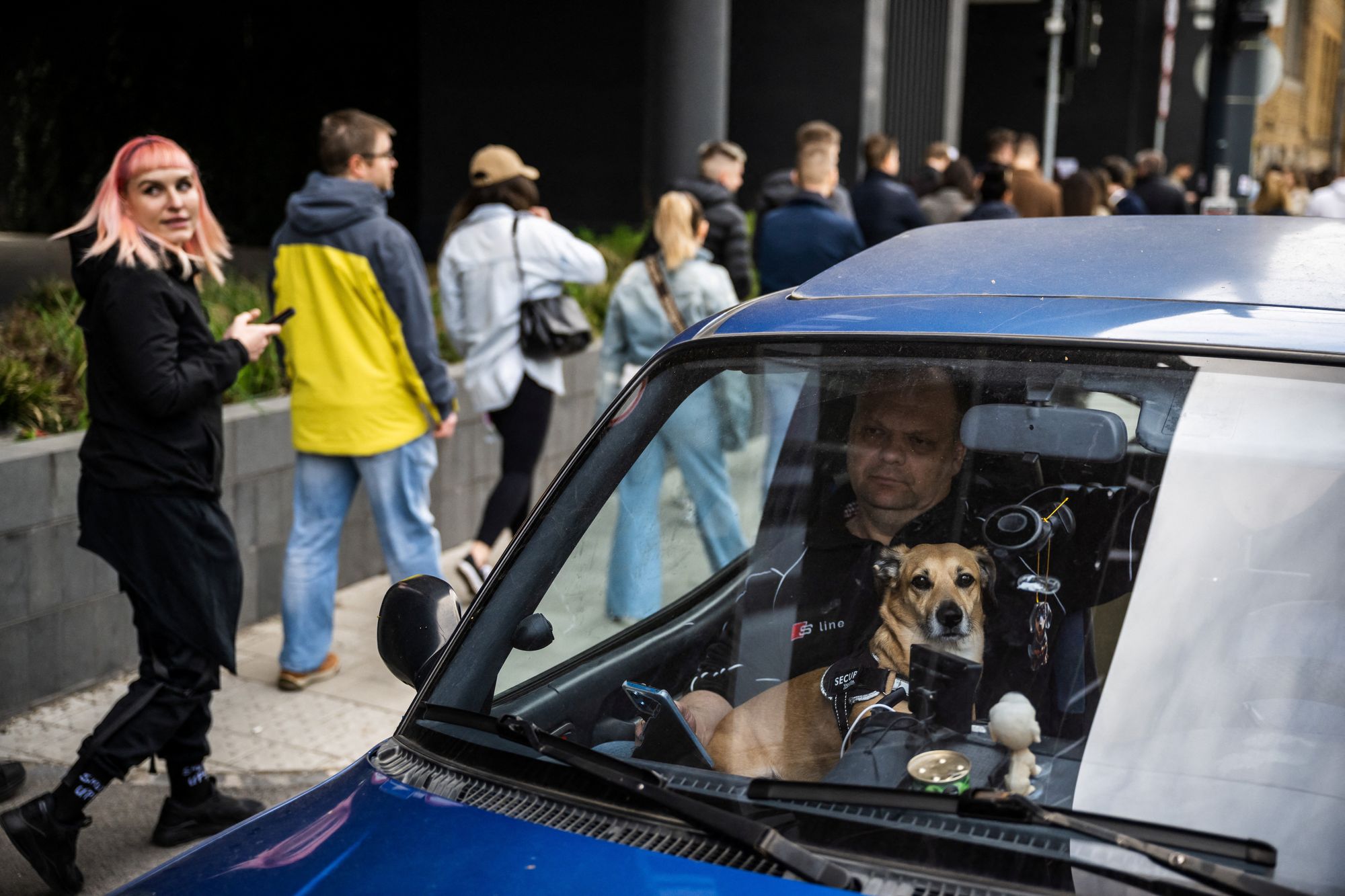 People wait in line to vote in Budapest