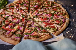 Domino's is rolling out thinner pizzas in a new Italian-inspired range it hopes will buy a slice of the more premium market and cater to new customers