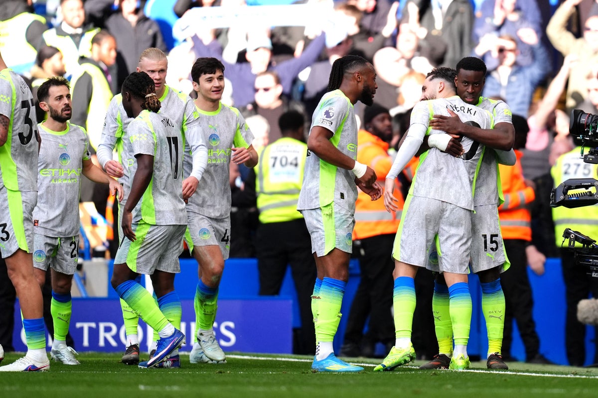 Man City close gap on leaders Arsenal after easing to victory at Chelsea