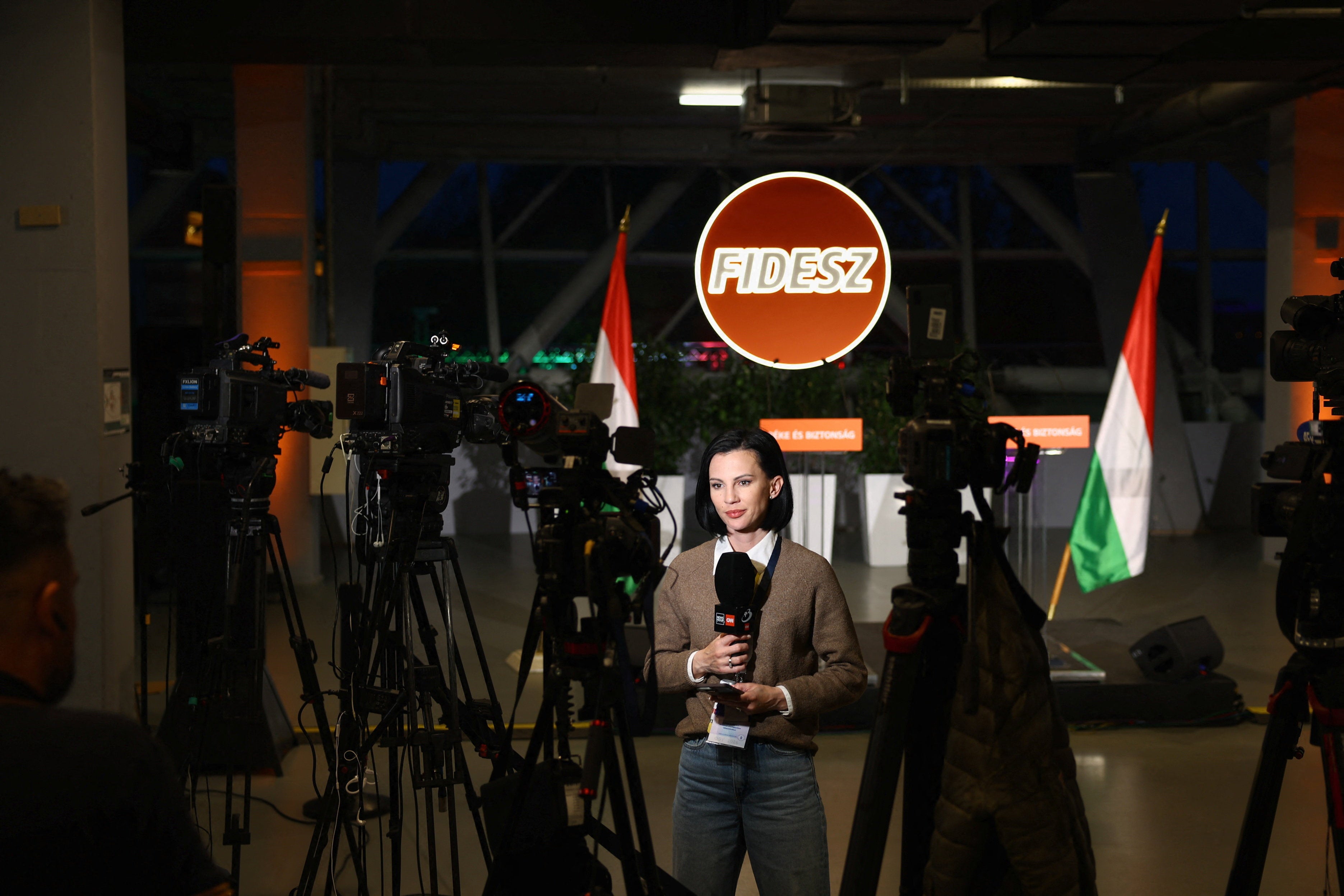 Members of the media work at the Fidesz Party headquarters on the day of the parliamentary election