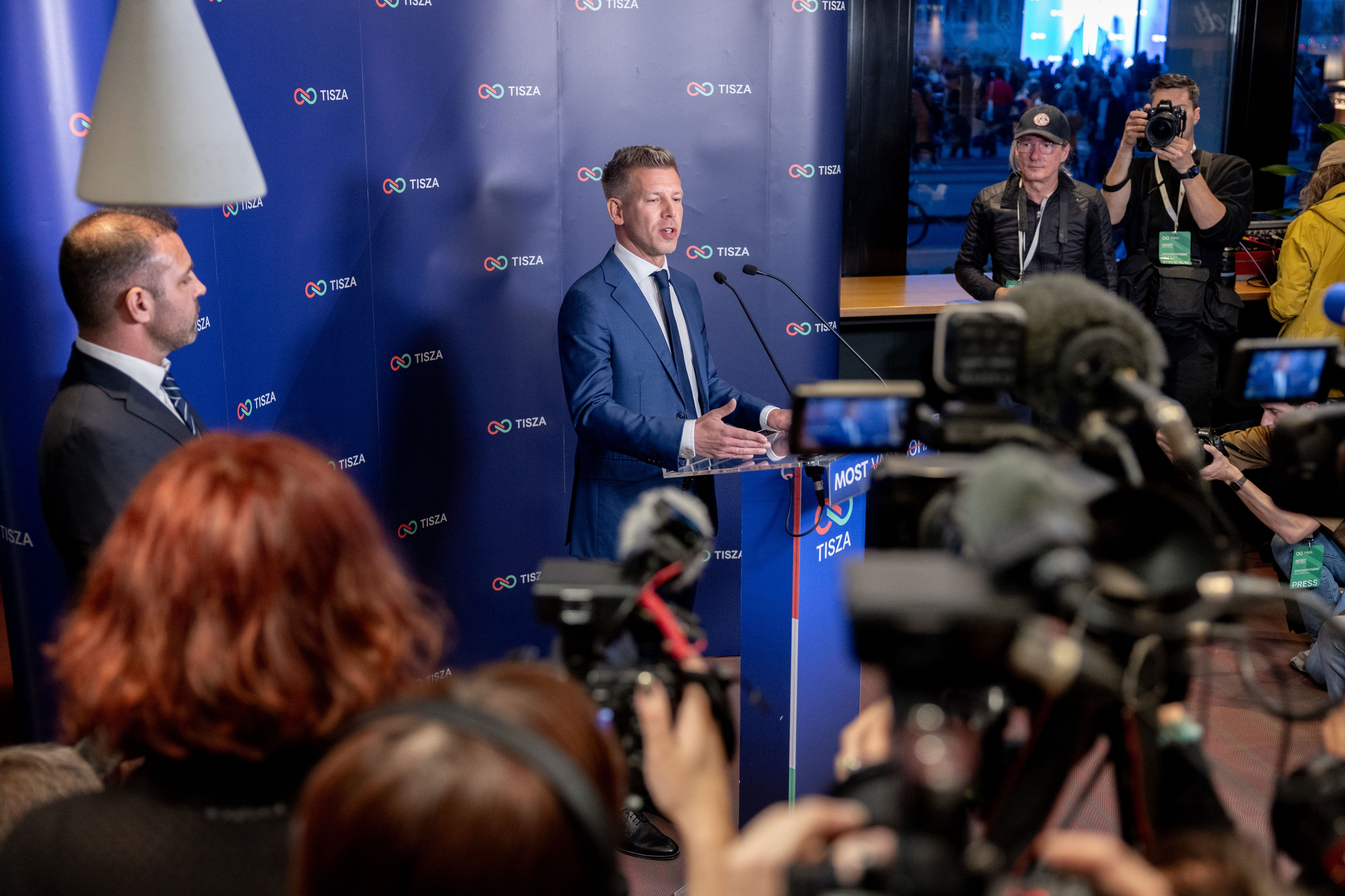 Peter Magyar, lead candidate of the Tisza party, speaks to the media after polling stations closed