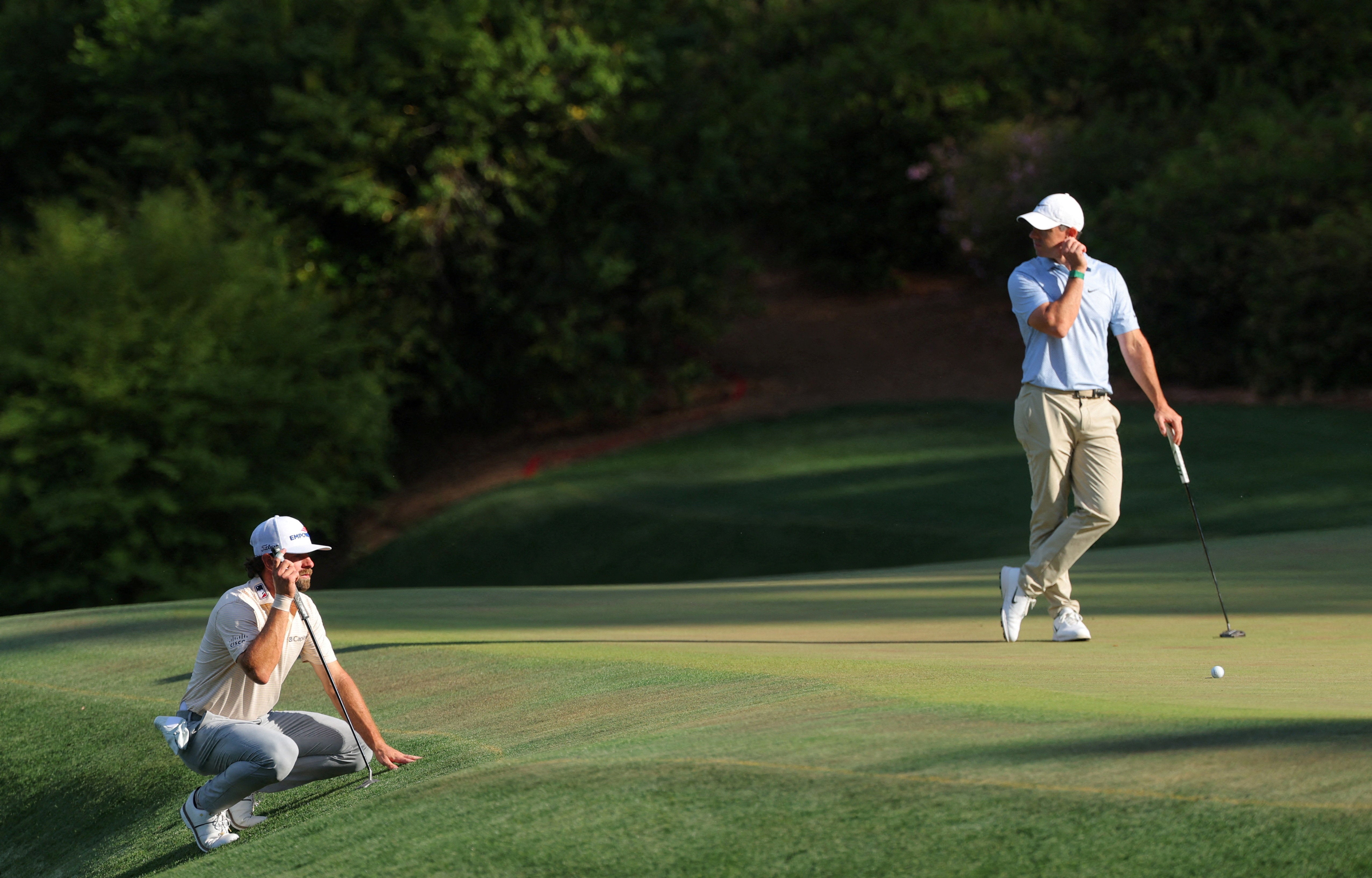 Rory McIlroy held off playing partner Cameron Young