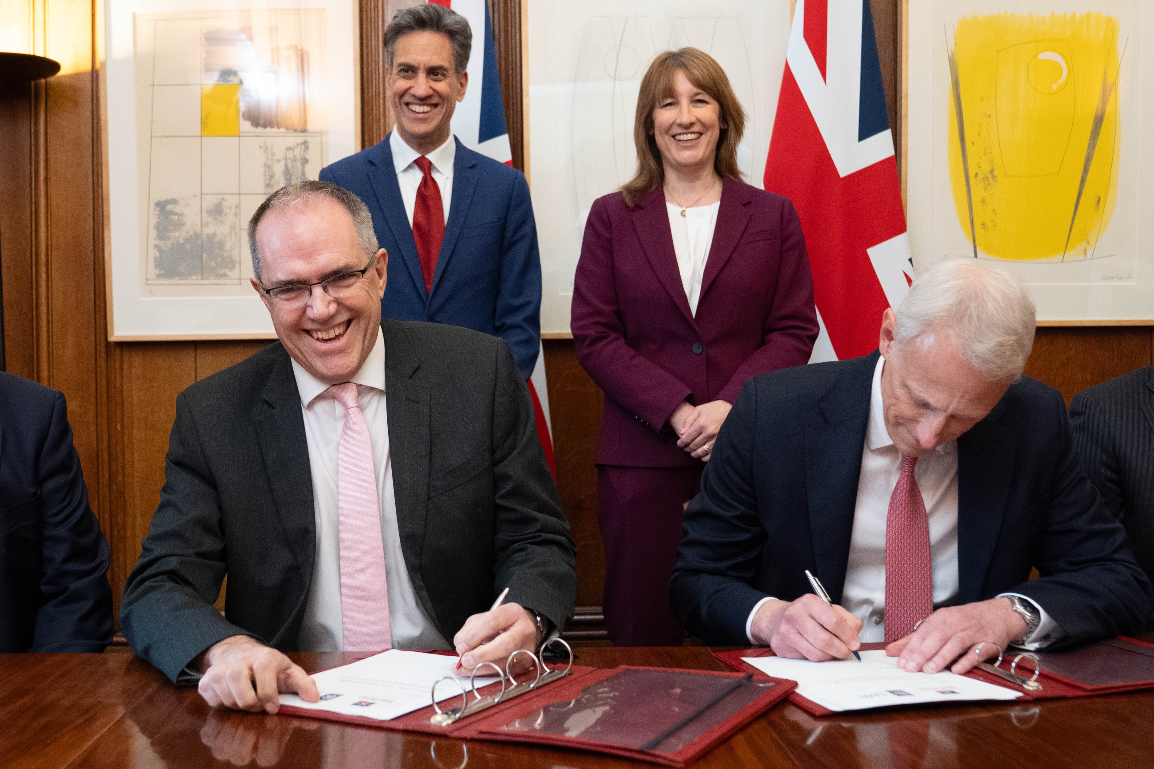 Rachel Reeves and Ed Miliband watch as Simon Roddy and Chris Cholerton sign a deal to drive forward the development of SMRs