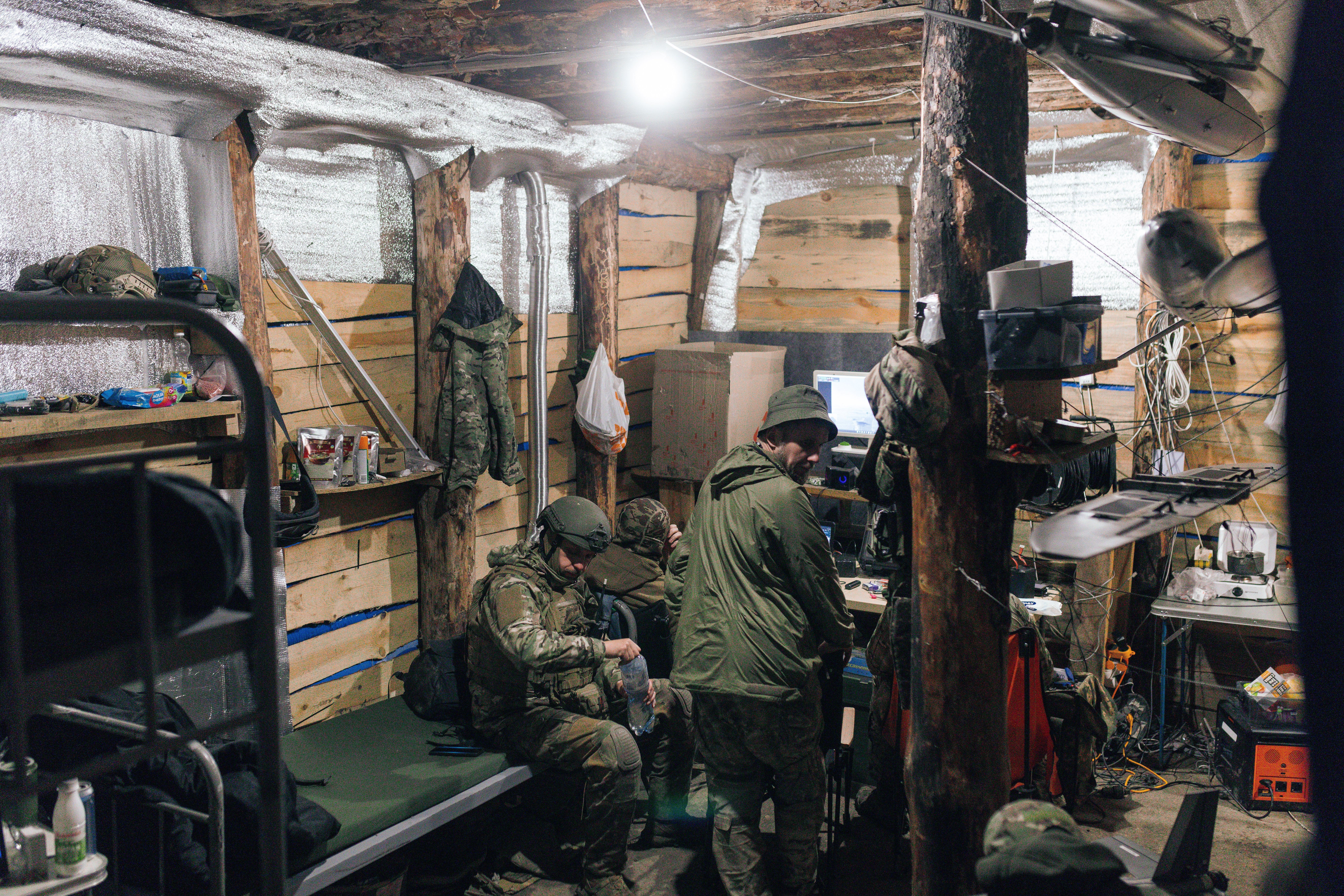 Soldiers from the 'Taifun' unmanned aerial vehicle unit are stationed in a dugout, where they live and carry out combat missions in Kharkiv