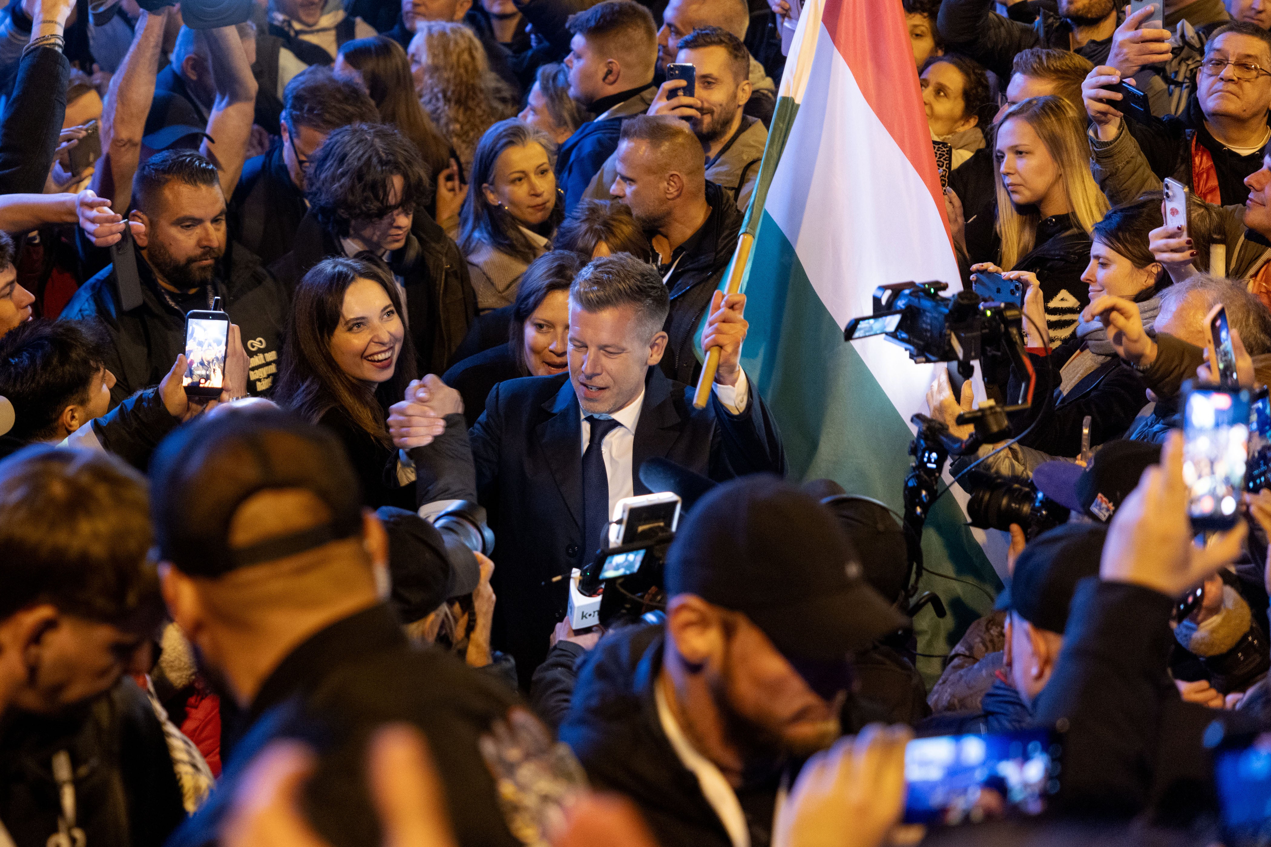 Peter Magyar, lead candidate of the Tisza party, greets his supporters after the Tisza party won the parliamentary elections on April 12, 2026 in Budapest, Hungary