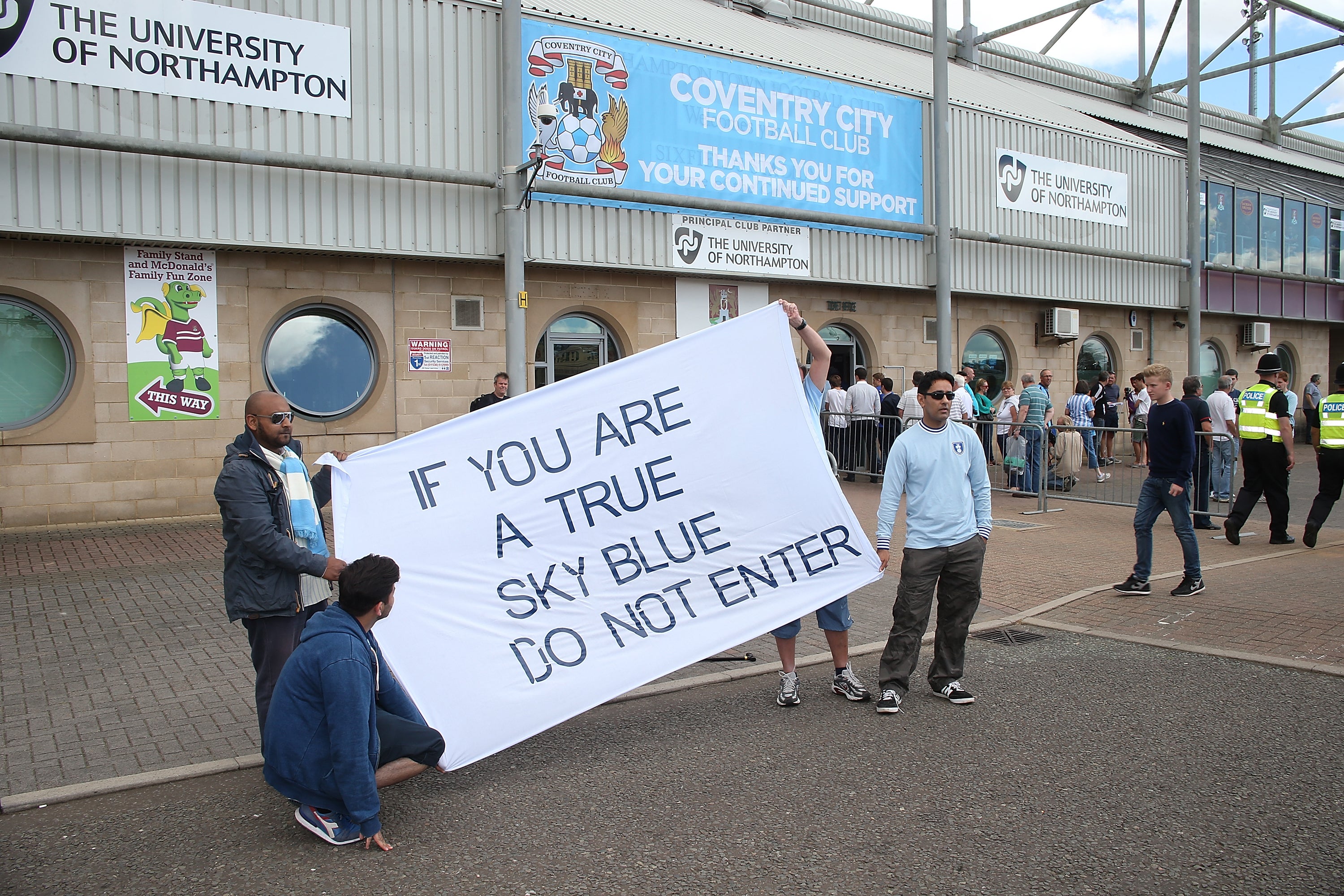 Coventry City fans protest prior to a 'home' match at Sixfields Stadium, Northampton while down in League One in 2013