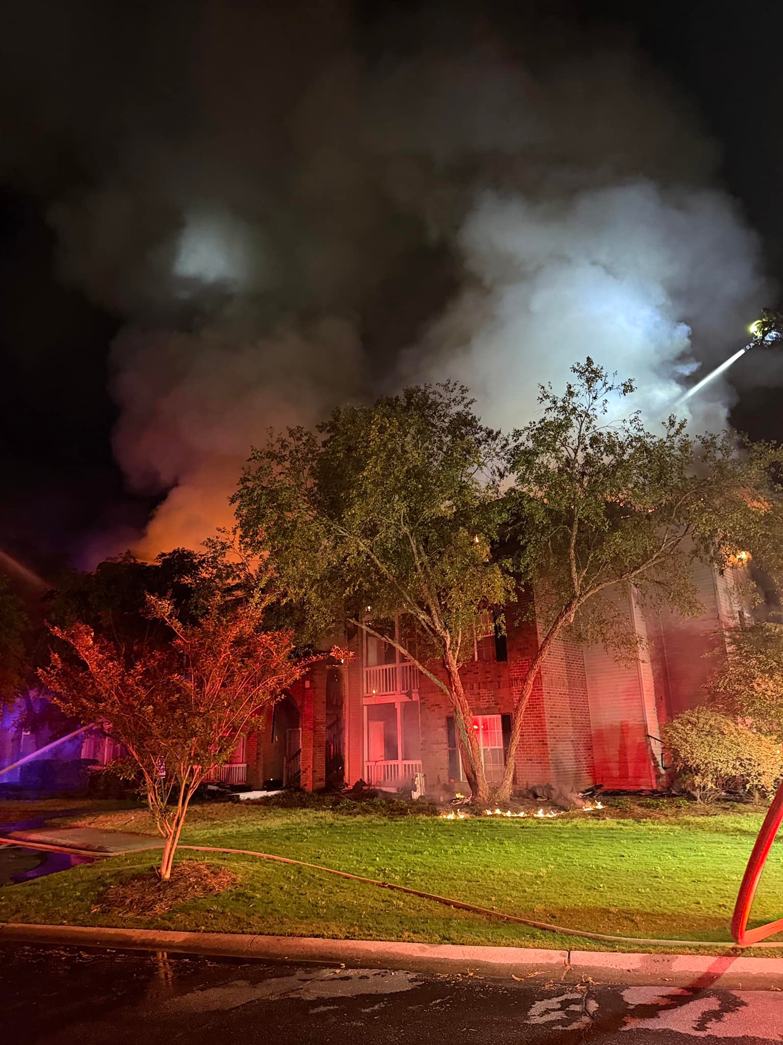 Part of the Georgetown Oaks apartment complex in Savannah, Georgia, ablaze during the small hours of Sunday April 12, 2026