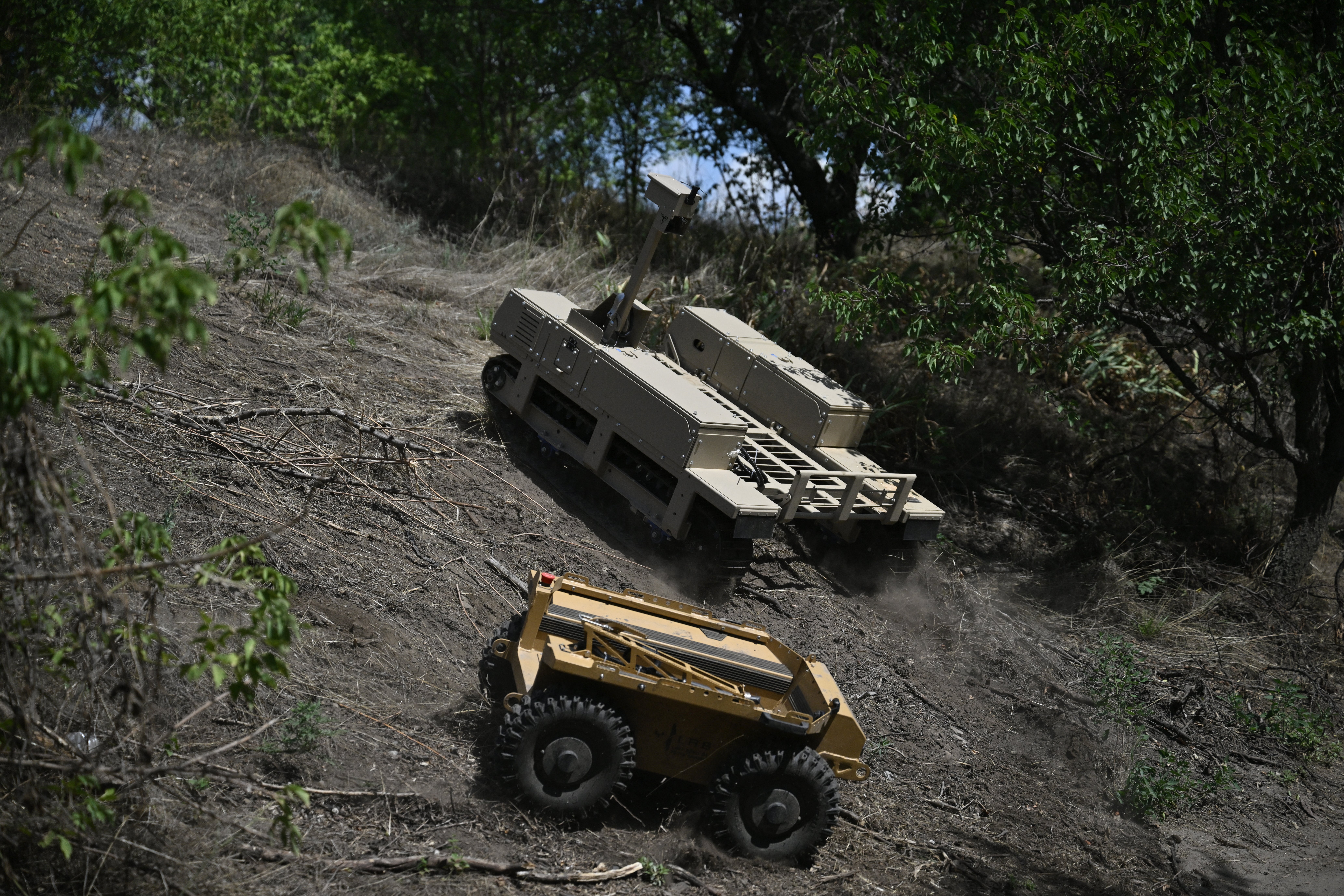Drones and non-armed military robotics are in heavy use in the Ukraine war, as is pictured here, serving roles ranging from bomb disposal to evacuating wounded troops, and experts urge the international community to establish guardrails around these new technologies as they continue to proliferate