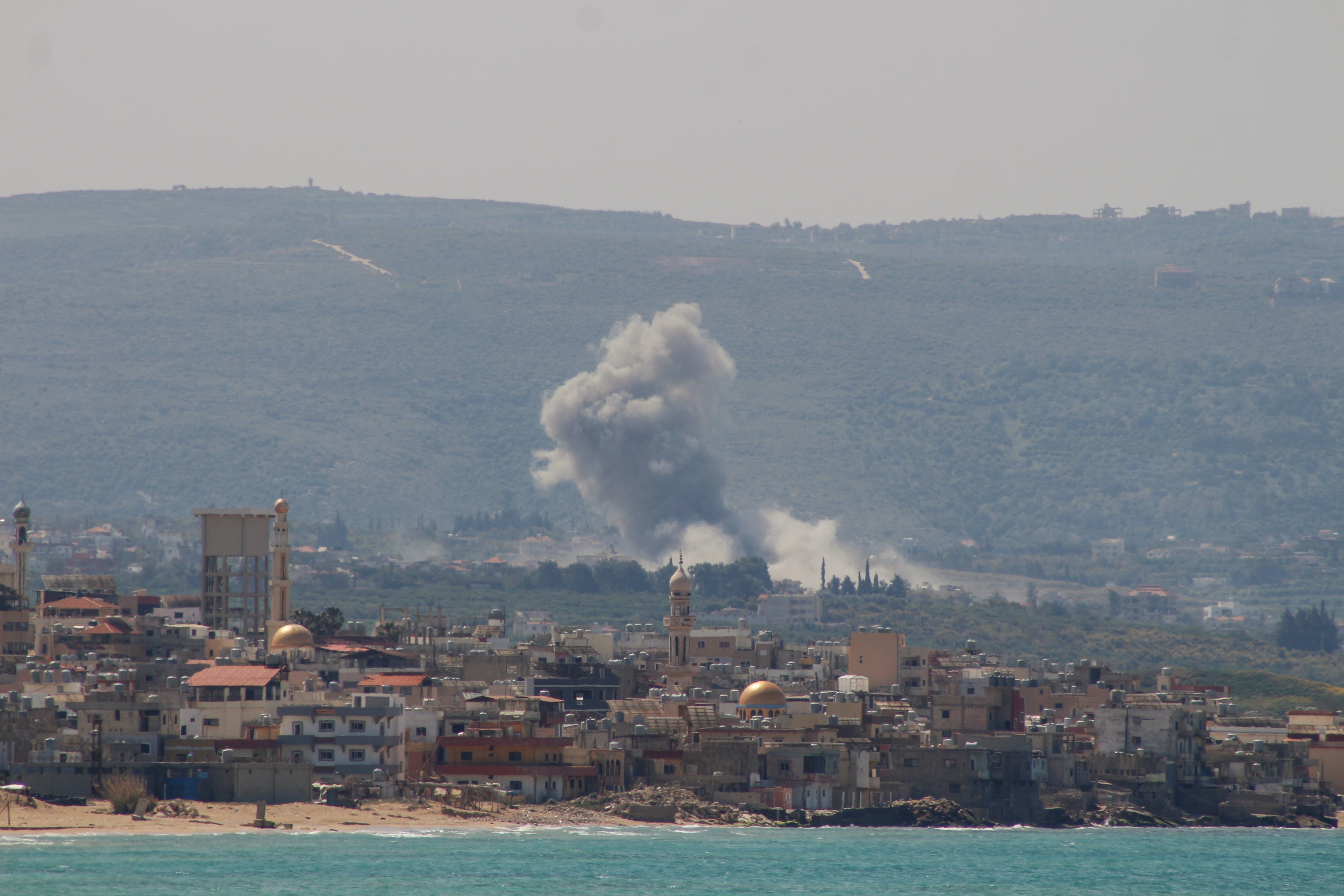 Smoke rises from the site of an Israeli airstrike that targeted the an area in the southern Lebanese village of Qlaile.