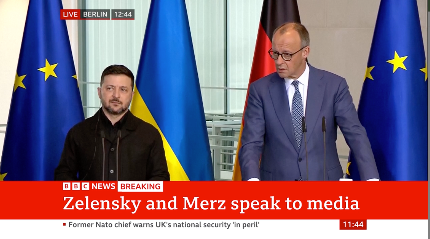 Zelensky and Merz speaking to the media on Tuesday