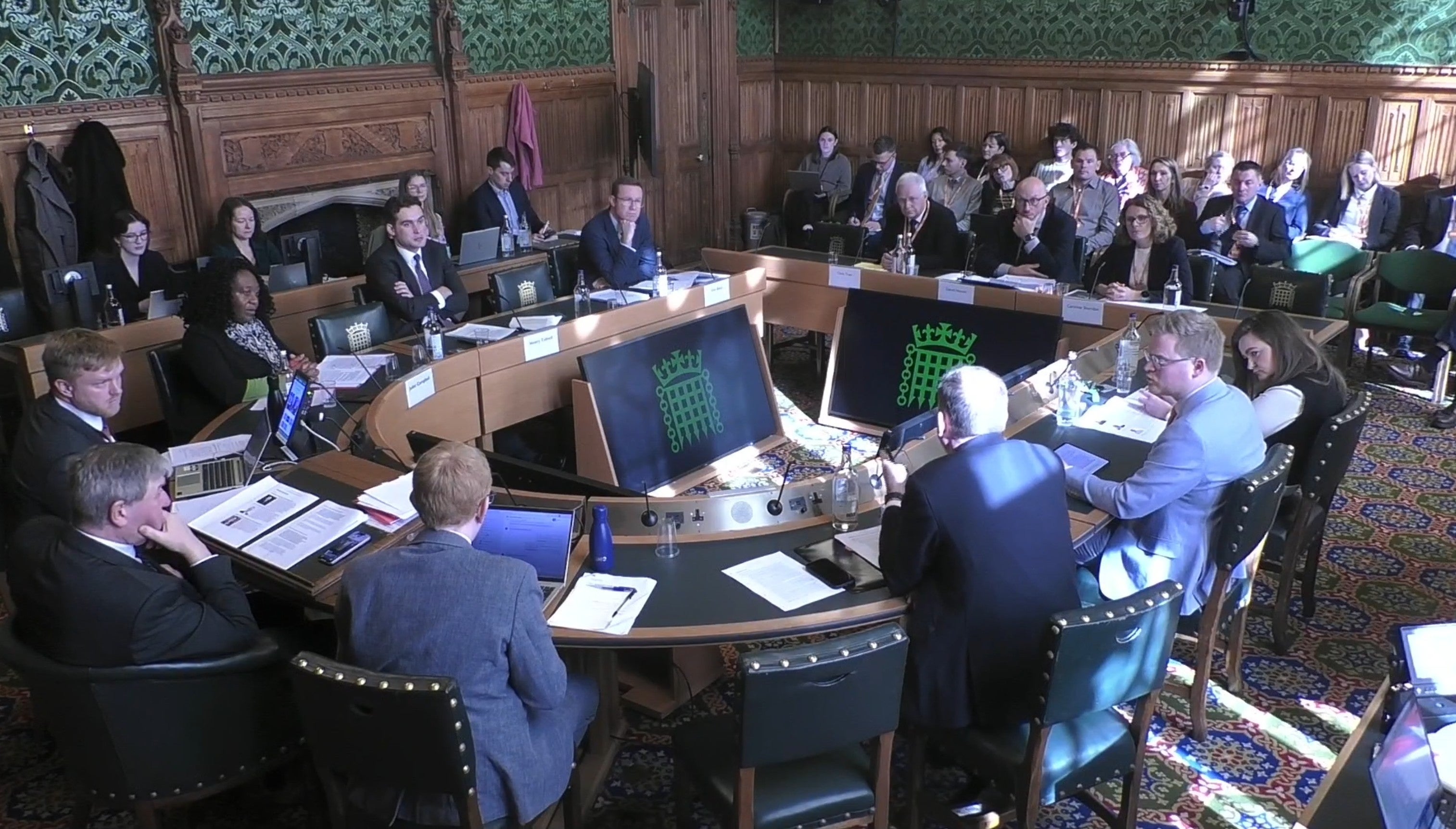 Southeastern Water bosses (behind) appear before the Environment, Food and Rural Affairs Committee