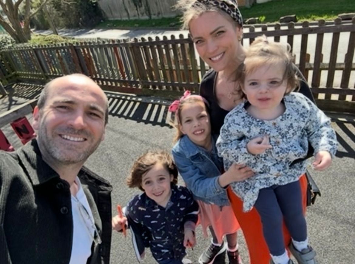 Ms Priest with her family, (from left) James, Lucas, Emilia and Ivy, after finishing a year of treatment