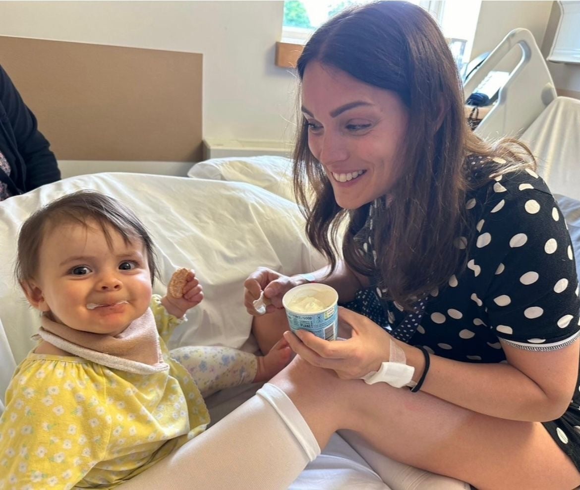 Ms Priest in hospital with Ivy after her mastectomy