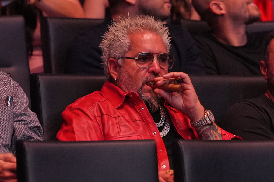 Guy Fieri's interactions with Andrew Tate and Tristan Tate at UFC 327 have gone viral, with the Food Network star now apologizing for the it
