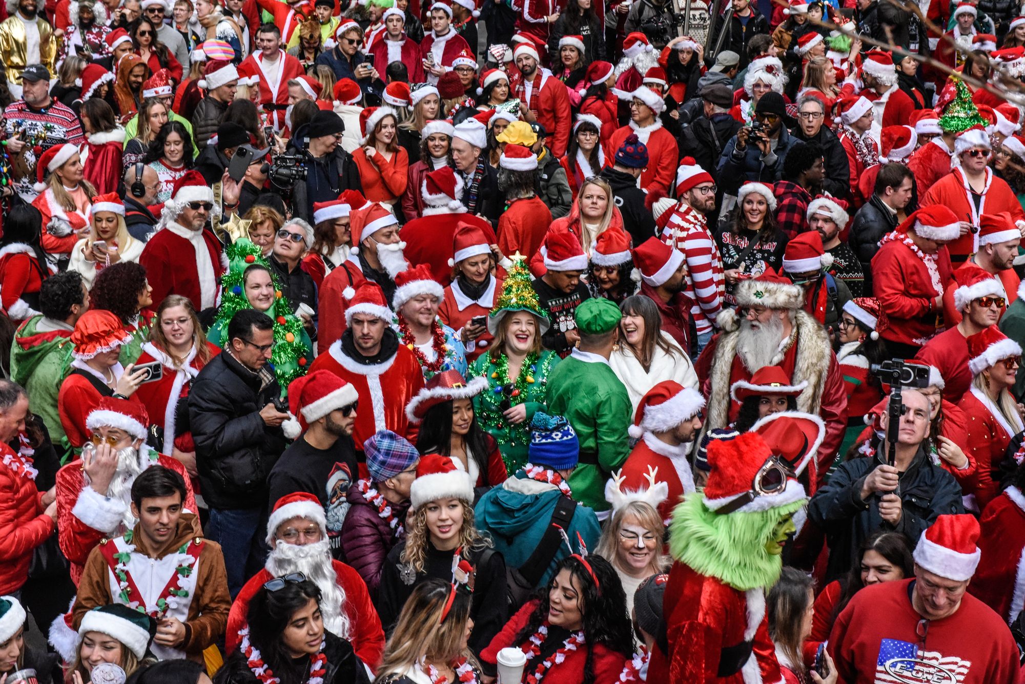 SantaCon organizer arrested as the feds label popular holiday event a ...