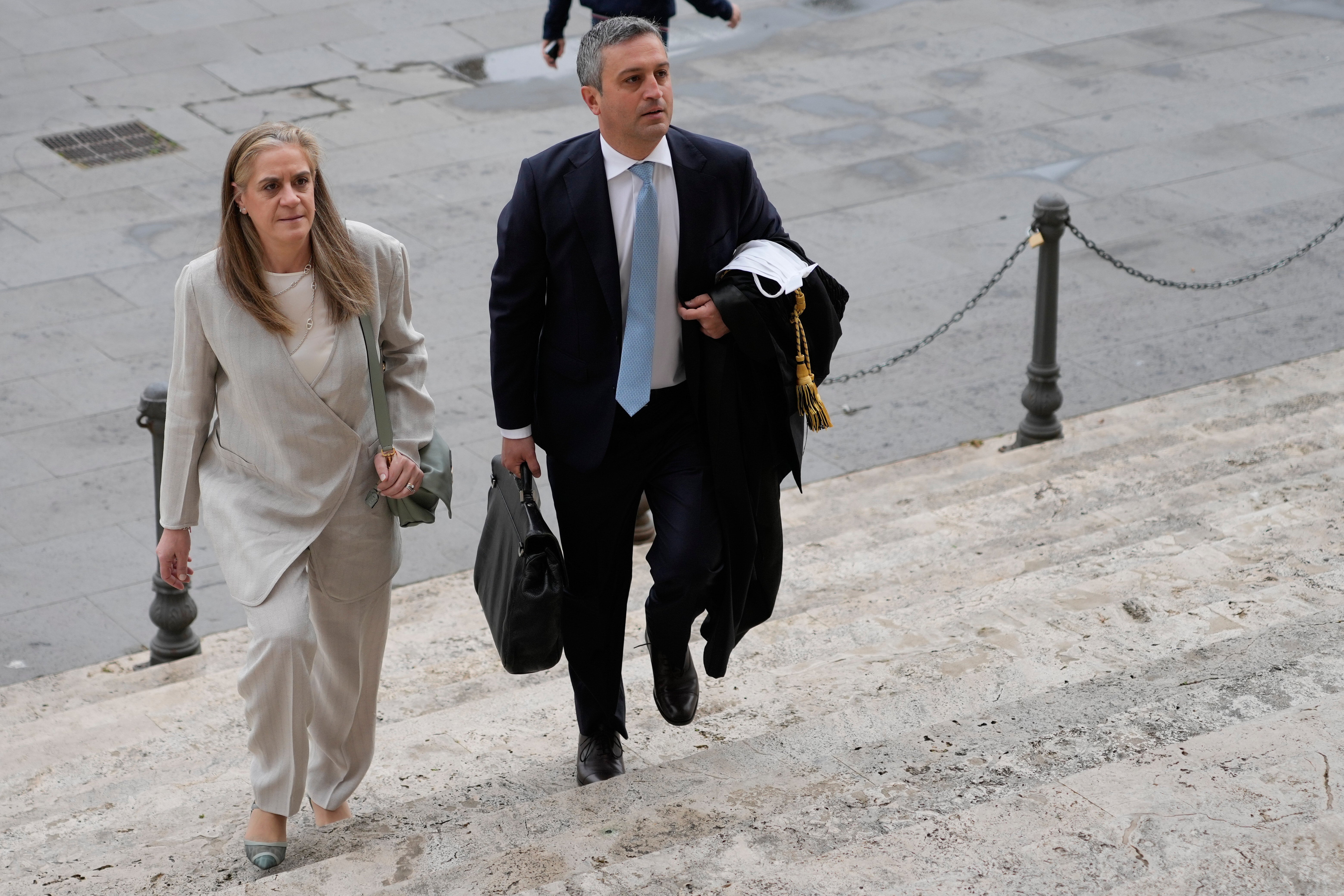 Italian lawyers Marco Mellone and Graziella Cerulli arrive at Italy's highest Court of Cassation, in Rome, Tuesday, April 14, 2026, to argue against the new citizenship law that restricts citizenship by descent