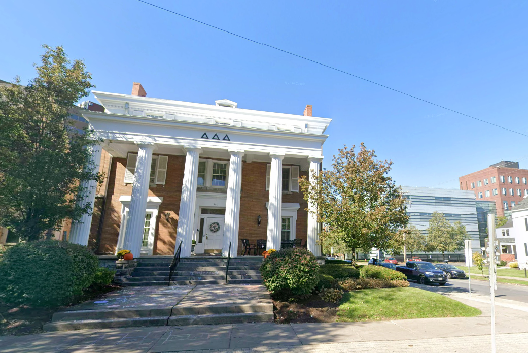 The banner, displayed Monday on the Delta Delta Delta sorority house, was quickly taken down