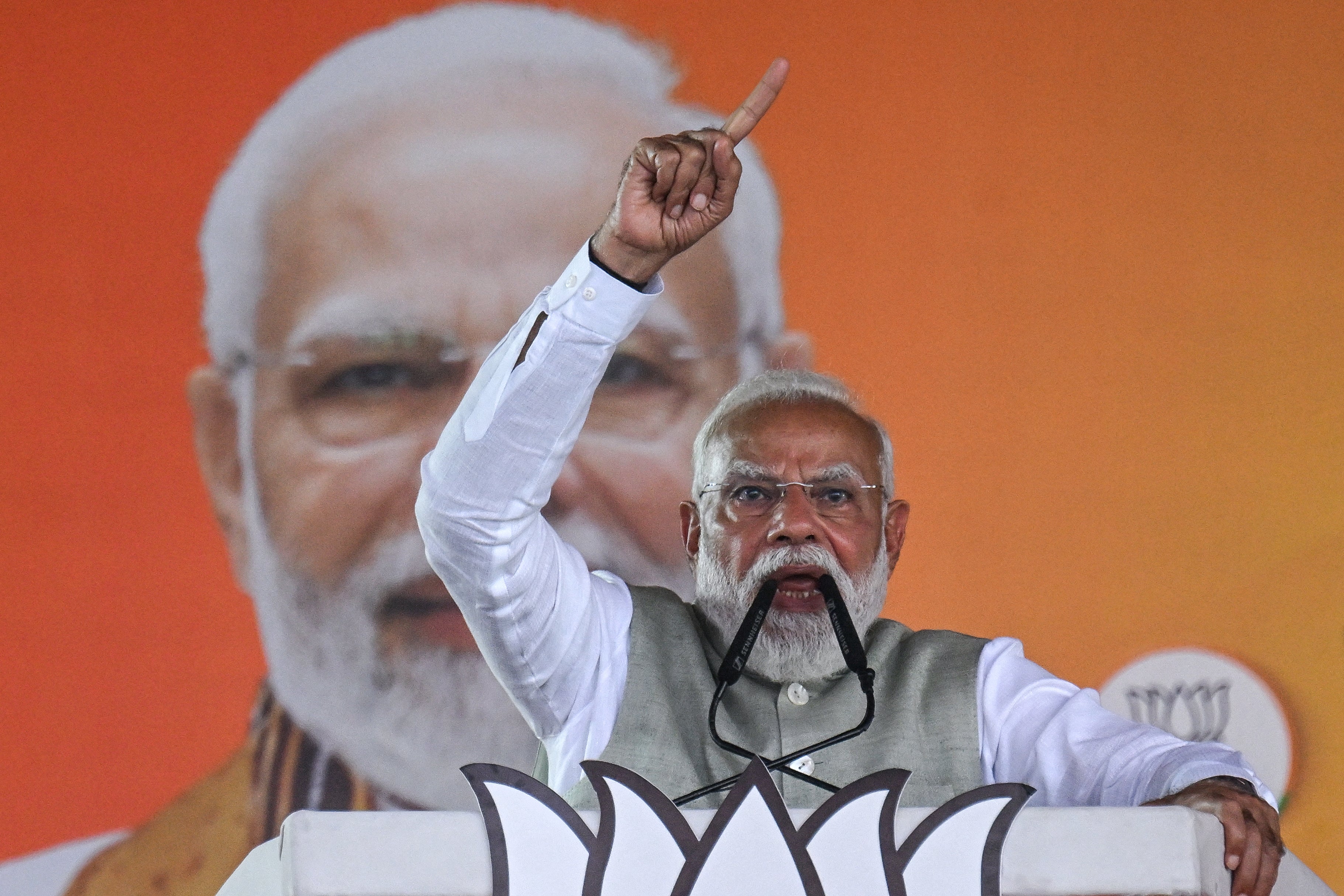 India's prime minister and Bharatiya Janata Party (BJP) leader Narendra Modi addresses his supporters during a mass rally in Kolkata on 14 March 2026