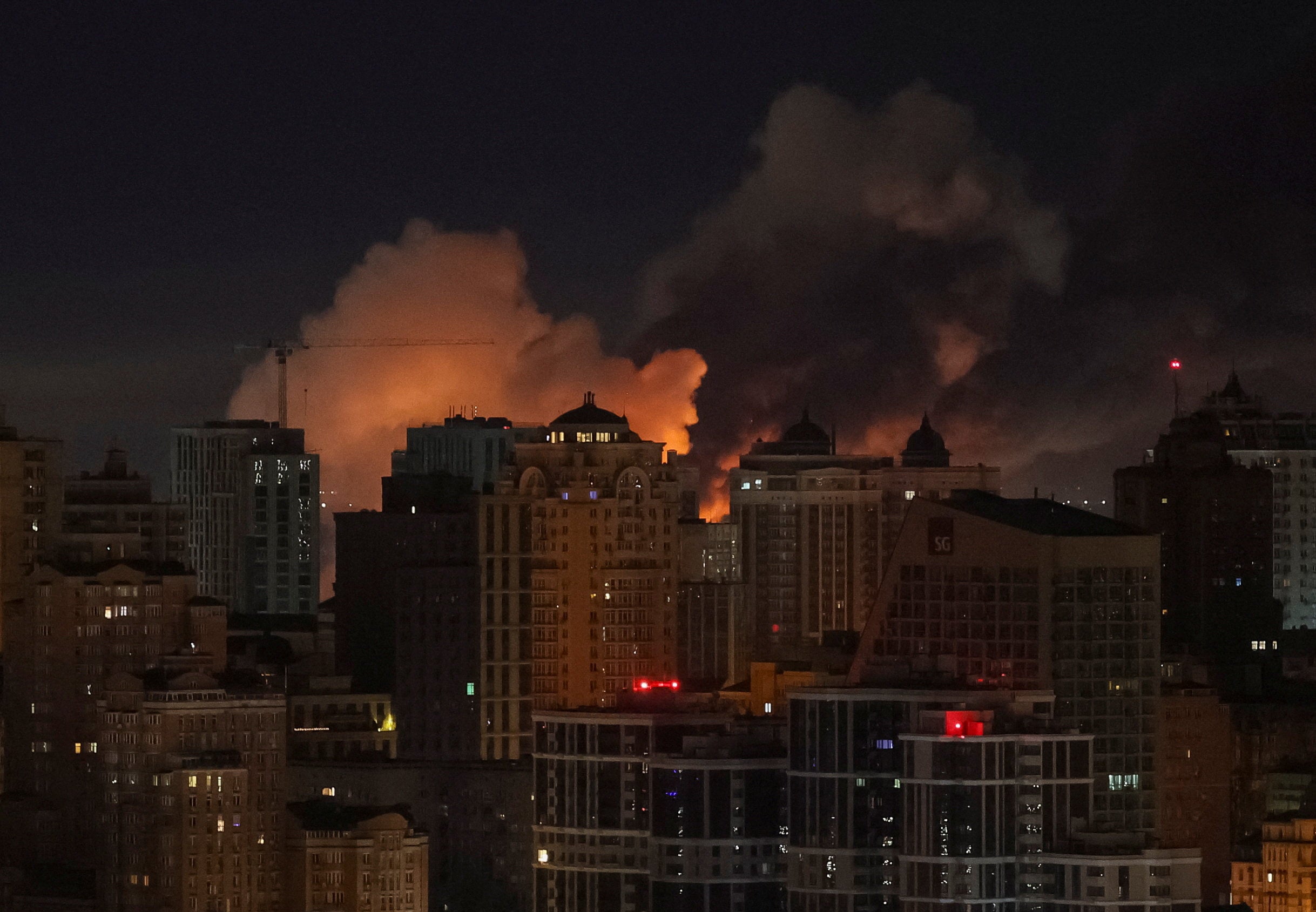 Smoke rises as a missile explodes during a Russian missile strike in Kyiv