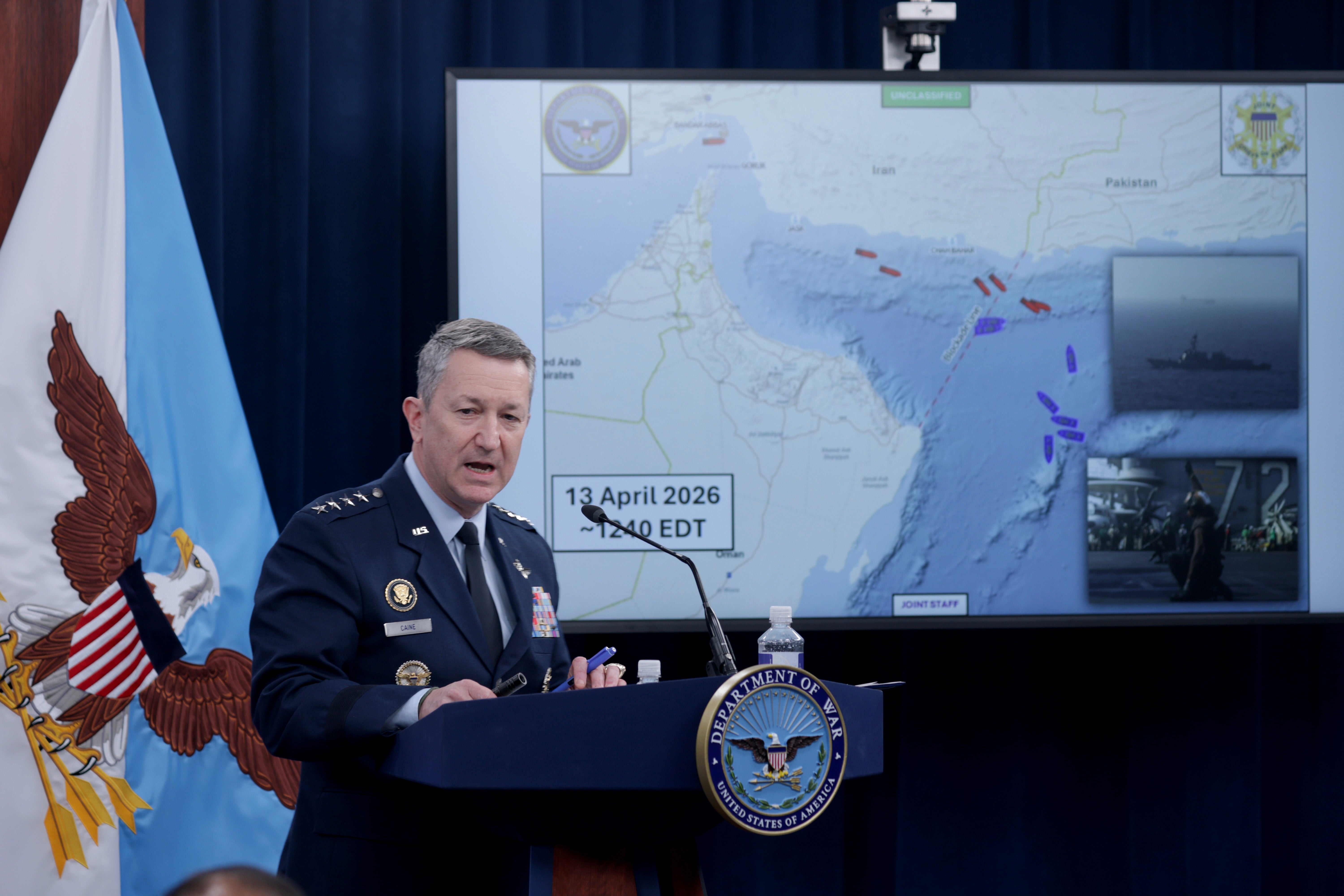 Chairman of the Joint Chiefs of Staff Gen. Dan Caine speaks as he displays a map showing the United States Navy's blockade of the Strait of Hormuz