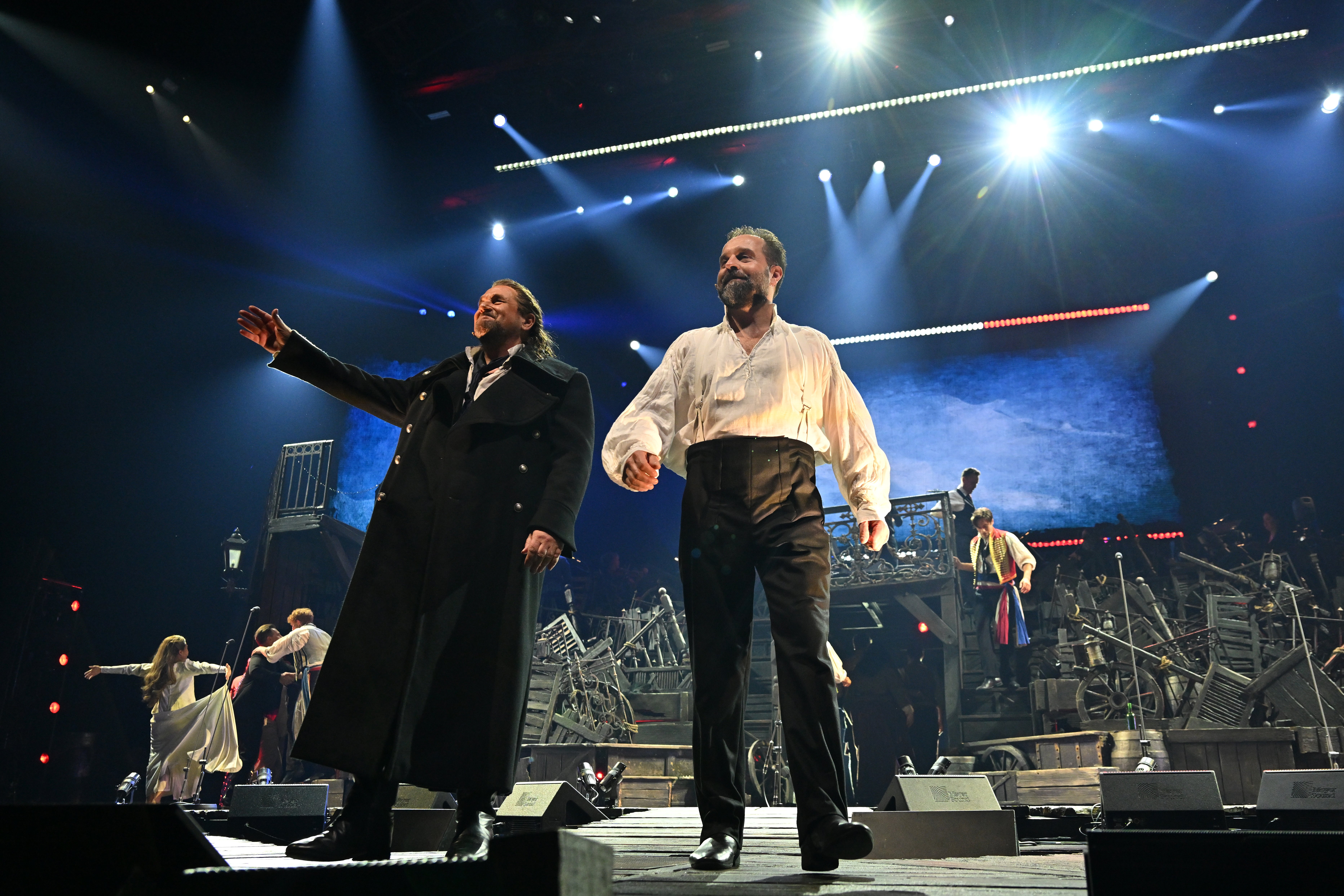 Michael Ball and Alfie Boe at the curtain call during Les Misérables: The Arena Spectacular Gala Opening at ICC Sydney Theatre on 1 May 2025 in Sydney, Australia.