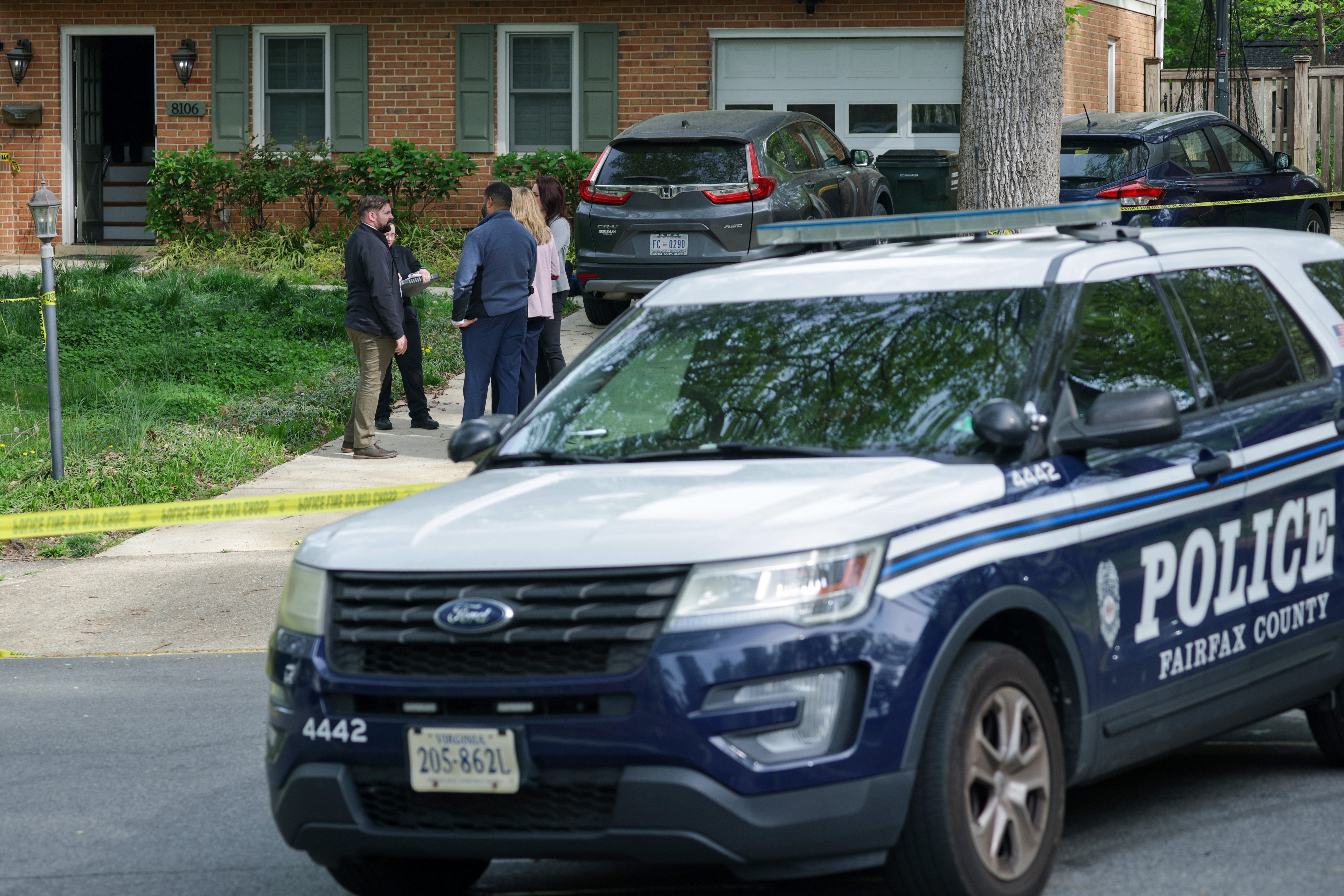 The couple’s two teenage children were at the family’s Annandale home (pictured) at the time of the shootings and their son called 911, police said