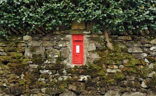 A post box in a wall at Grasmere, Lake District (Anna Gowthorpe/PA)