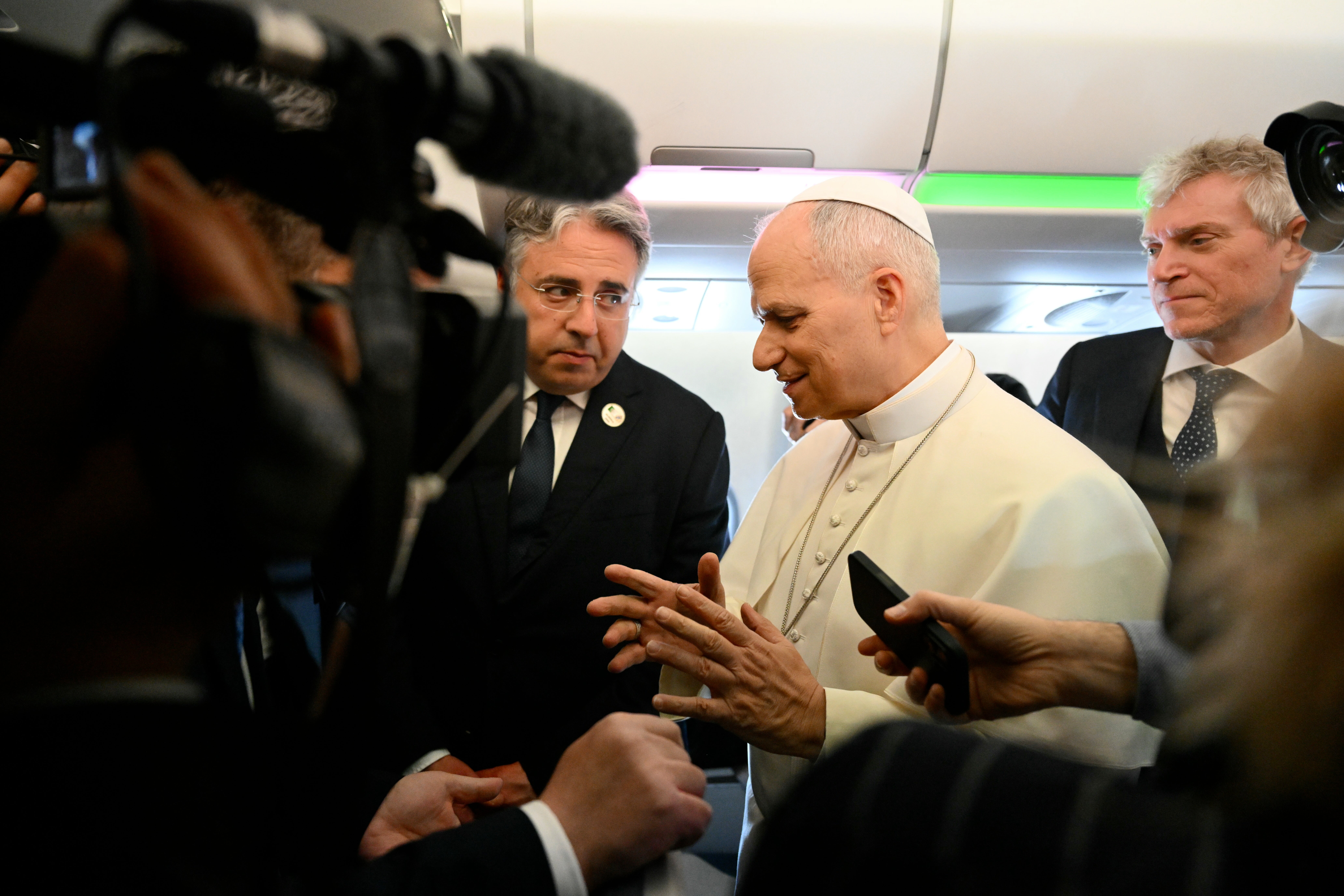 Pope Leo XIV speaks to journalists aboard his flight bound for Algiers’ Houari Boumédiène International Airport