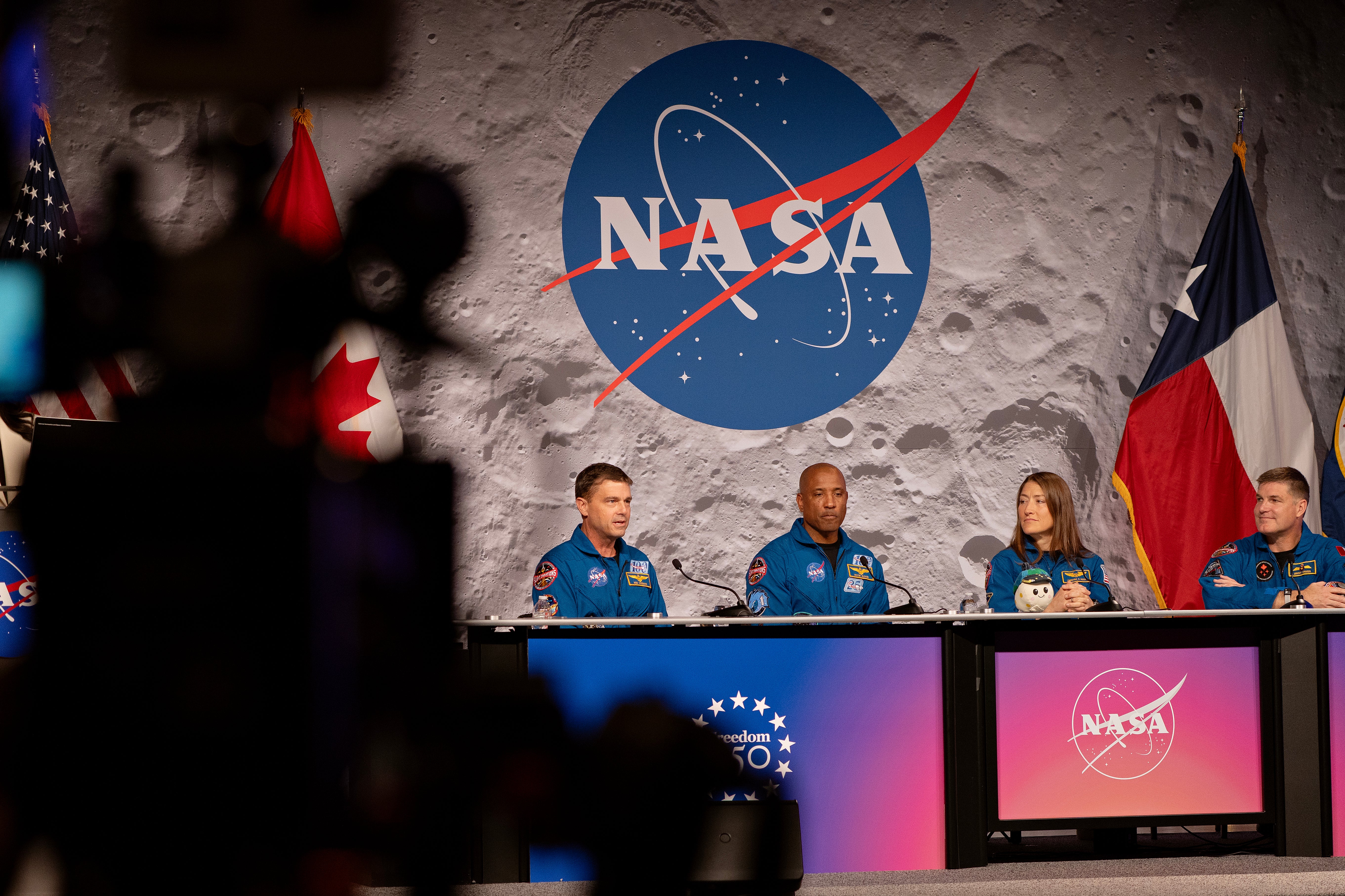 The quartet became the most distant human travelers ever, surpassing Apollo 13's record, as they circumnavigated the lunar far side