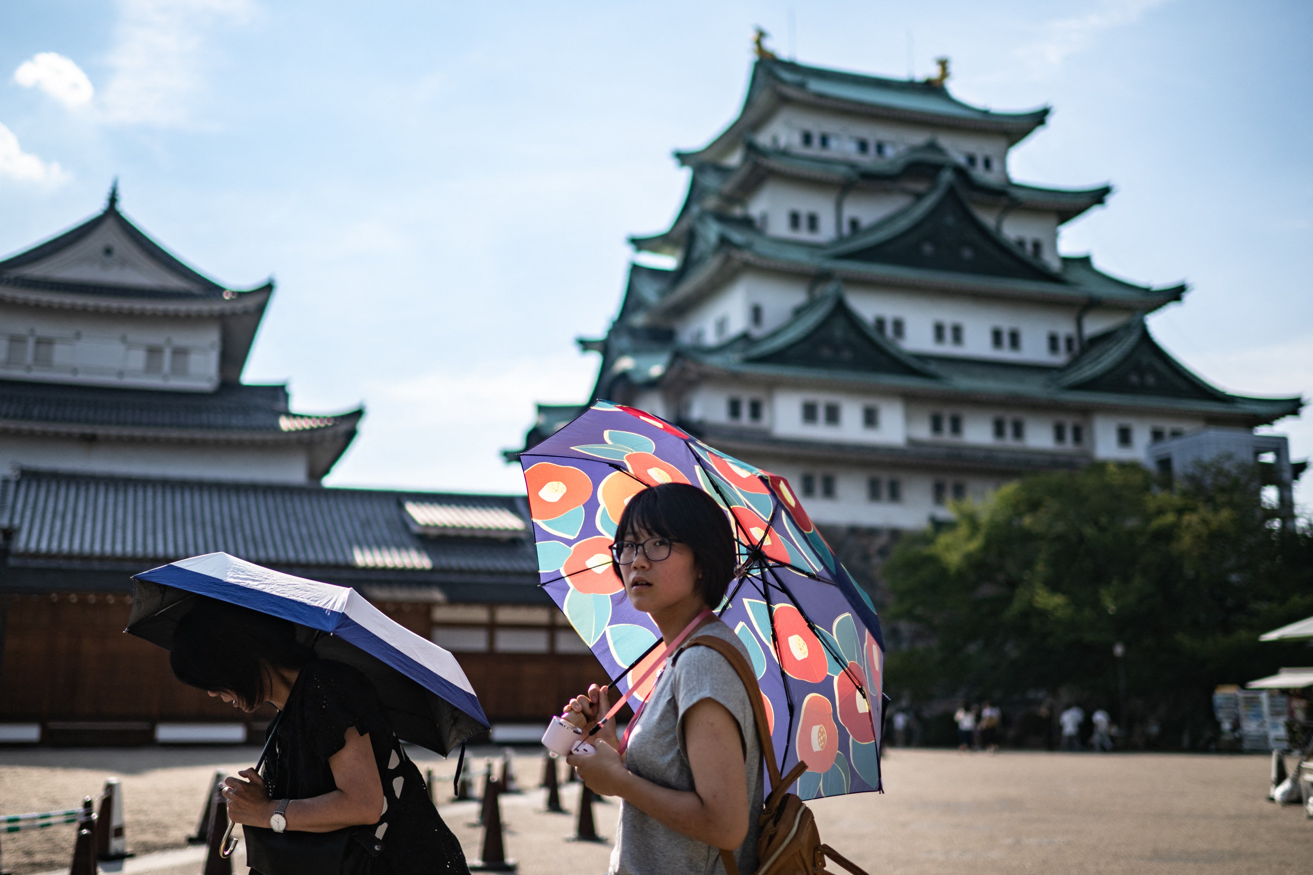 <p>People visit the Nagoya Castle on a hot day amid a heatwave </p>