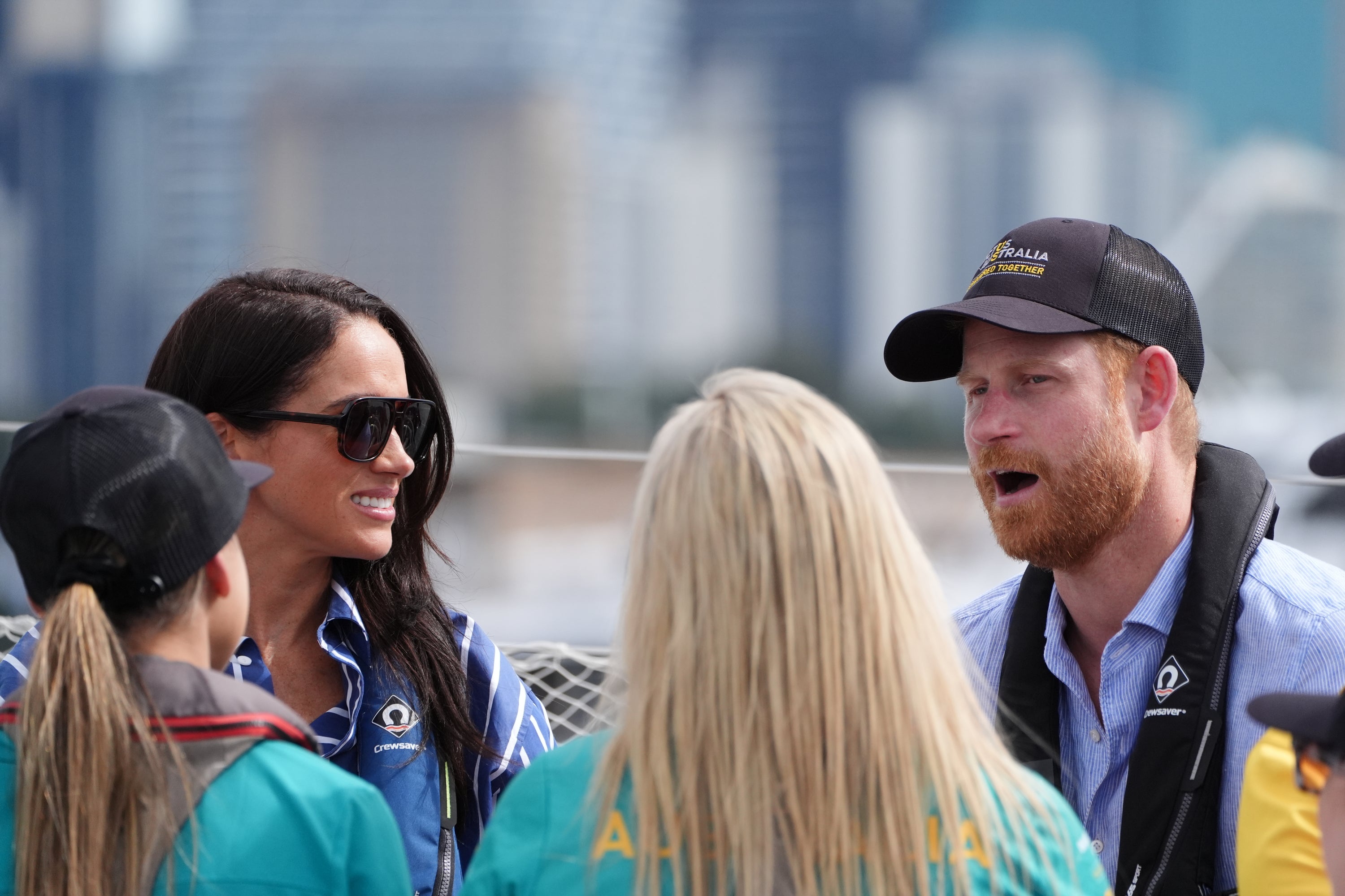 Prince Harry and Meghan, Duke and Duchess of Sussex, attend a sailing event with members of Invictus Australia in Sydney Harbor on Friday, April 17, 2026, in Sydney, Australia. (Jonathan Brady/Pool Photo via AP)