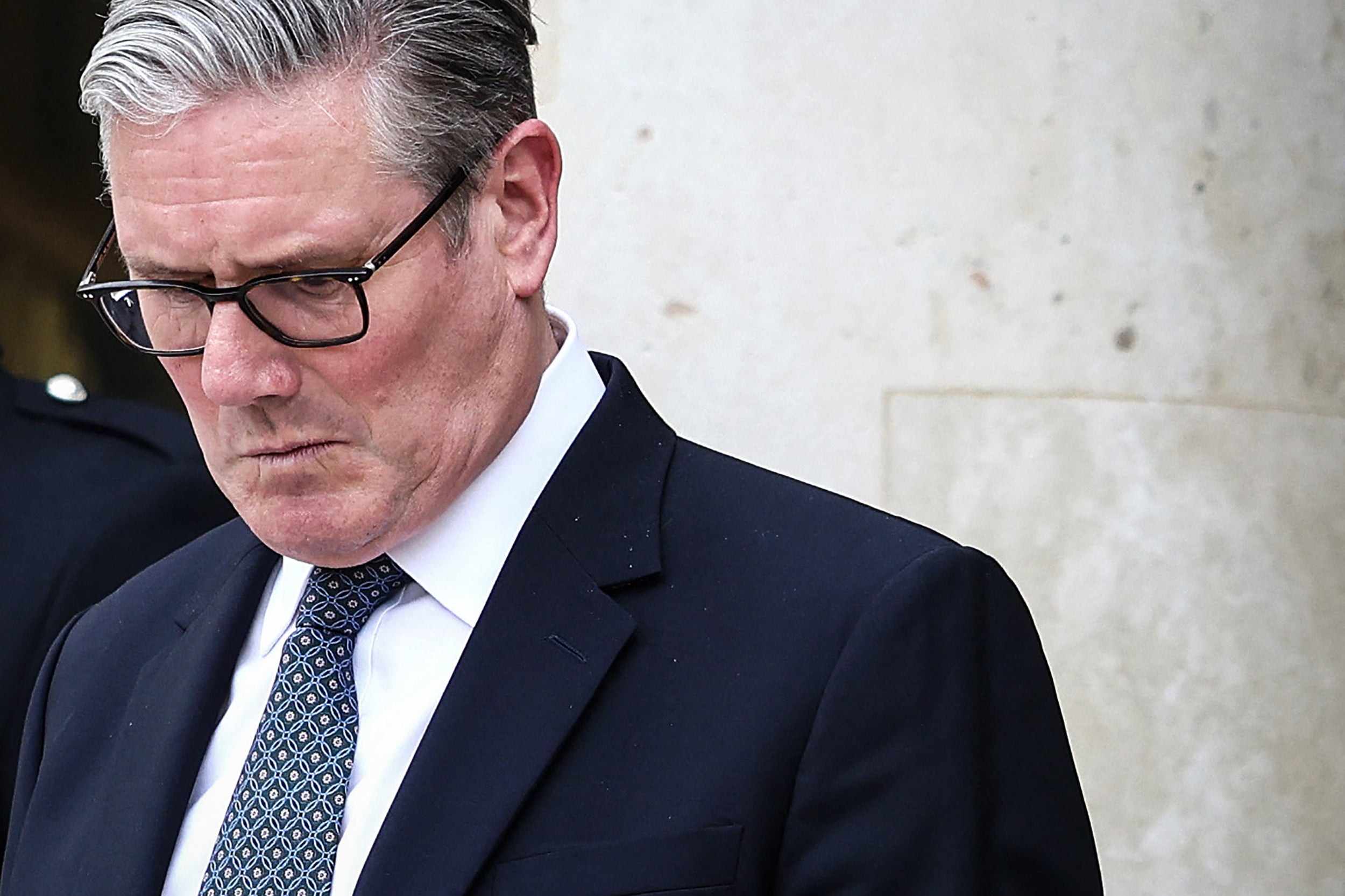 Keir Starmer must ‘persuade MPs – not least his own Labour benches – that he is neither incompetent nor a liar’ (AFP/Getty)