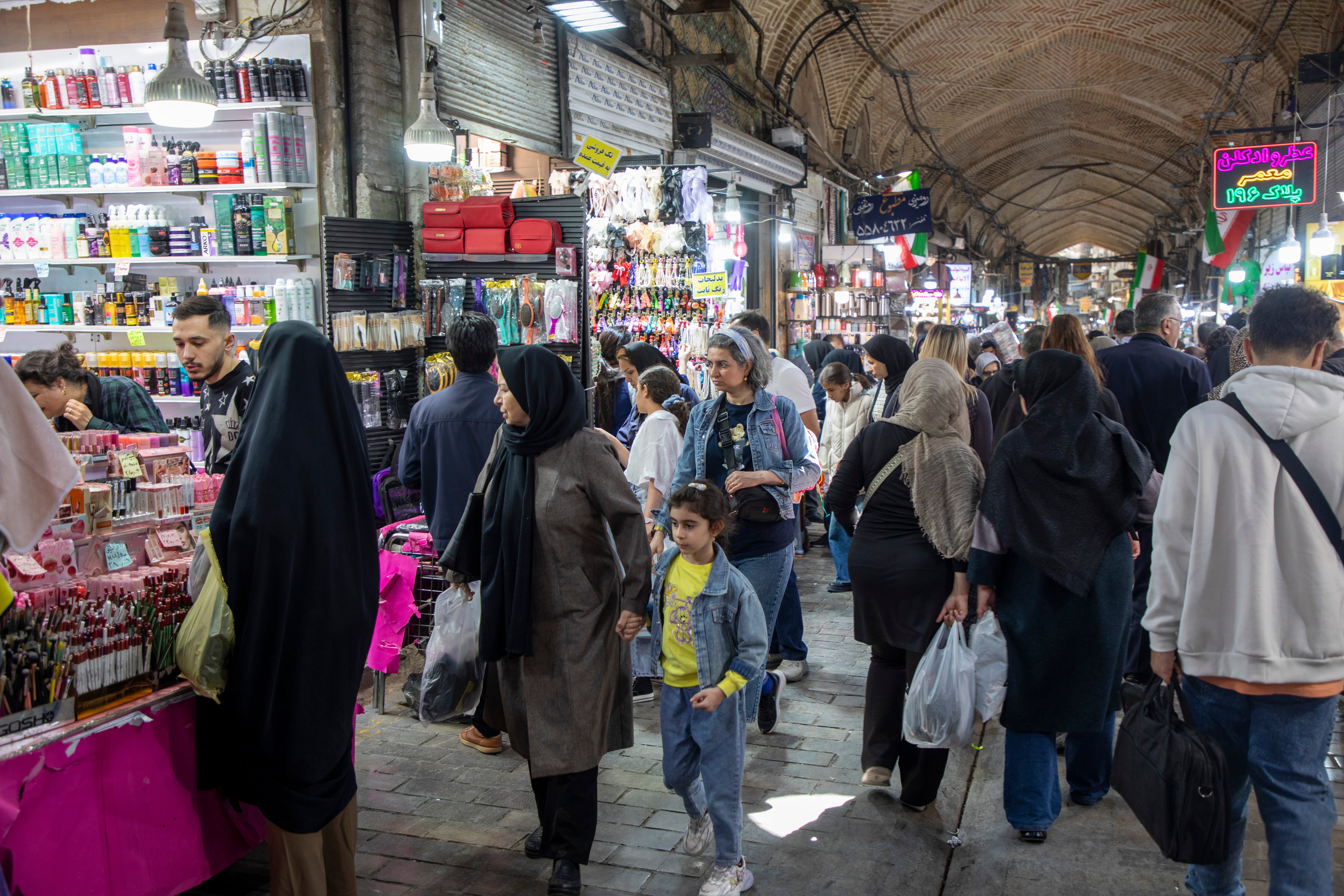 People browse stalls at the Tehran Grand Bazaar on April 16, 2026 in Tehran, Iran. For many, life has continued as normal.