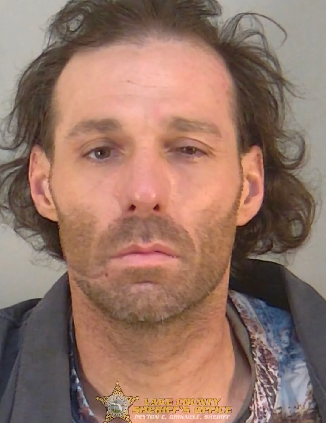 Matthew Lee Pasco, 43, allegedly tried to shoot a dog that was attacking a woman but instead fatally shot the animal’s owner, police say