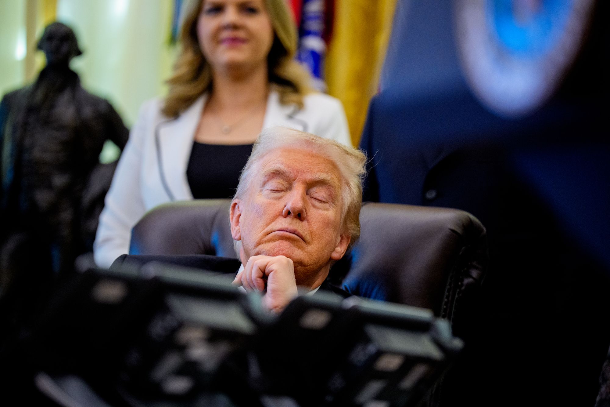 Trump has faced accusations of falling asleep during meetings, like when he was pictured with his eyes closed at an event in the Oval Office in November (Getty)