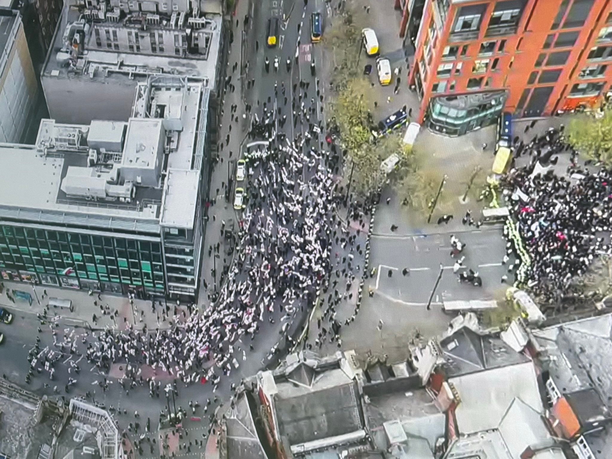 Britain First protesters march past counter-demonstrators