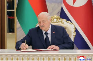 Belarus president Alexander Lukashenko signs a document in Pyongyang, North Korea Thursday, 26 March 2026