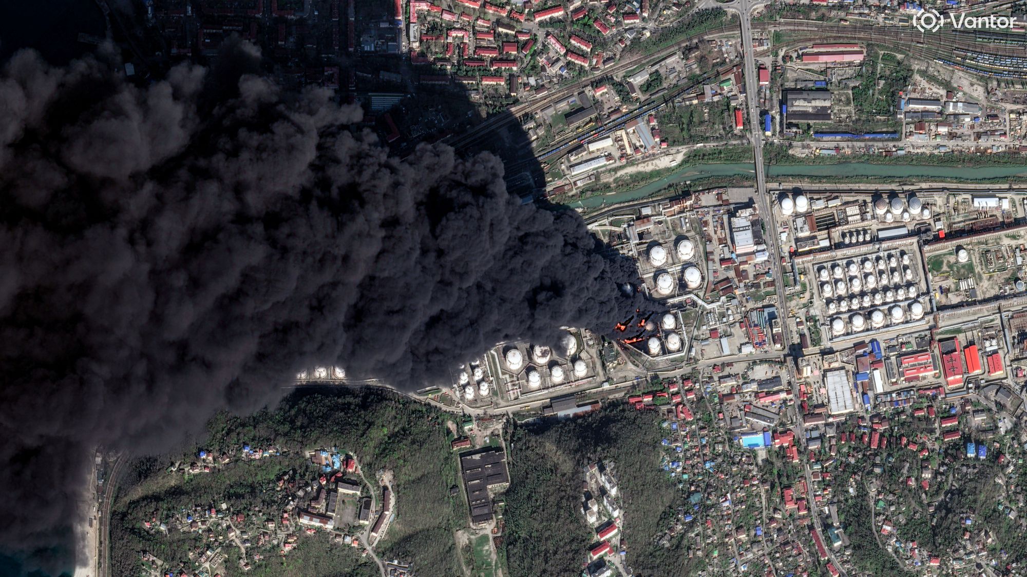 A satellite image shows smoke billowing from fire following drone attacks on a Russian oil facility in the Black Sea port of Tuapse in Krasnodar Krai