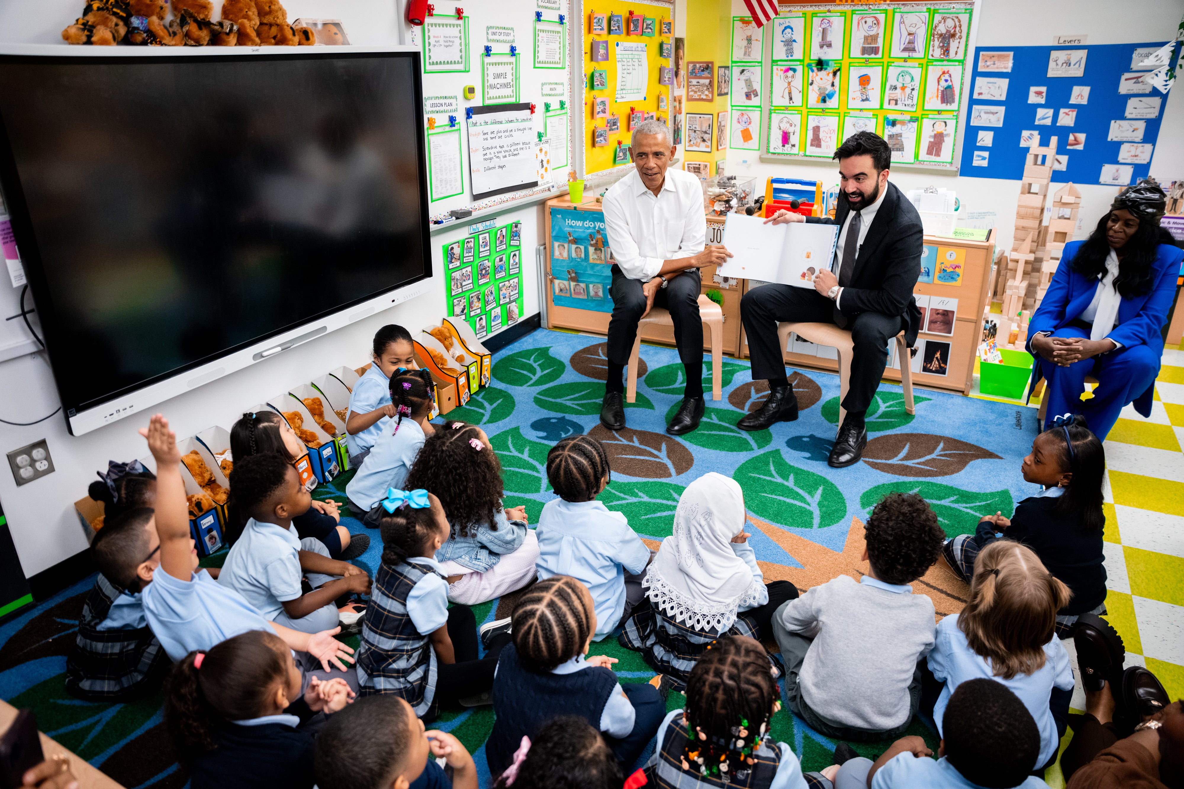 Photos show Obama and Mamdani reading to preschoolers in the Bronx