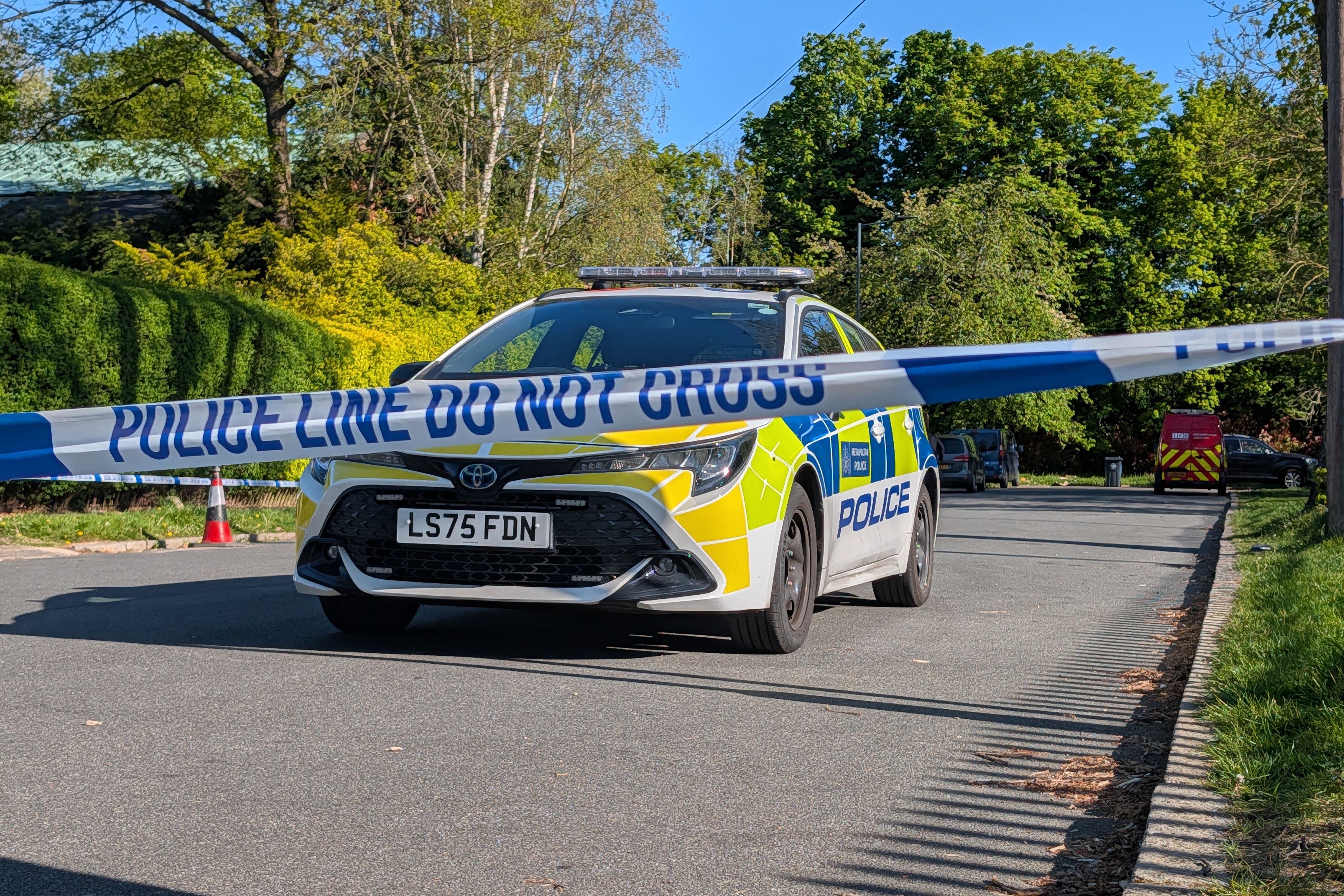 Police officers patrol at a cordon near an incident at the Kenton United Synagogue in Harrow, northwest London