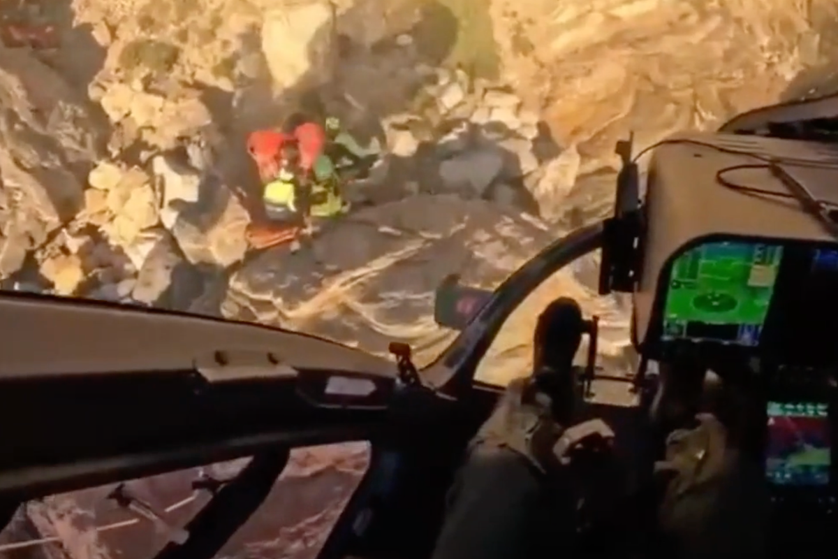 Speedy helicopter pick up rescues injured fisherman from cliffside
